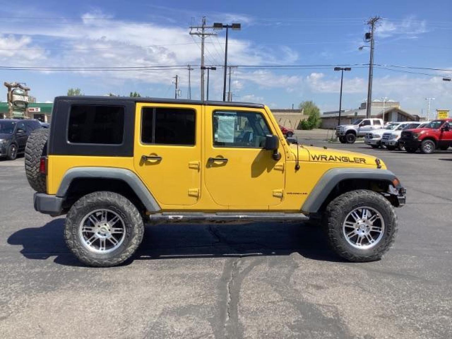 2008 YELLOW Jeep Wrangler Unlimited X 4WD (1J4GA39198L) with an 3.8L V6 OHV 12V engine, located at 1235 N Woodruff Ave., Idaho Falls, 83401, (208) 523-1053, 43.507172, -112.000488 - Photo#5