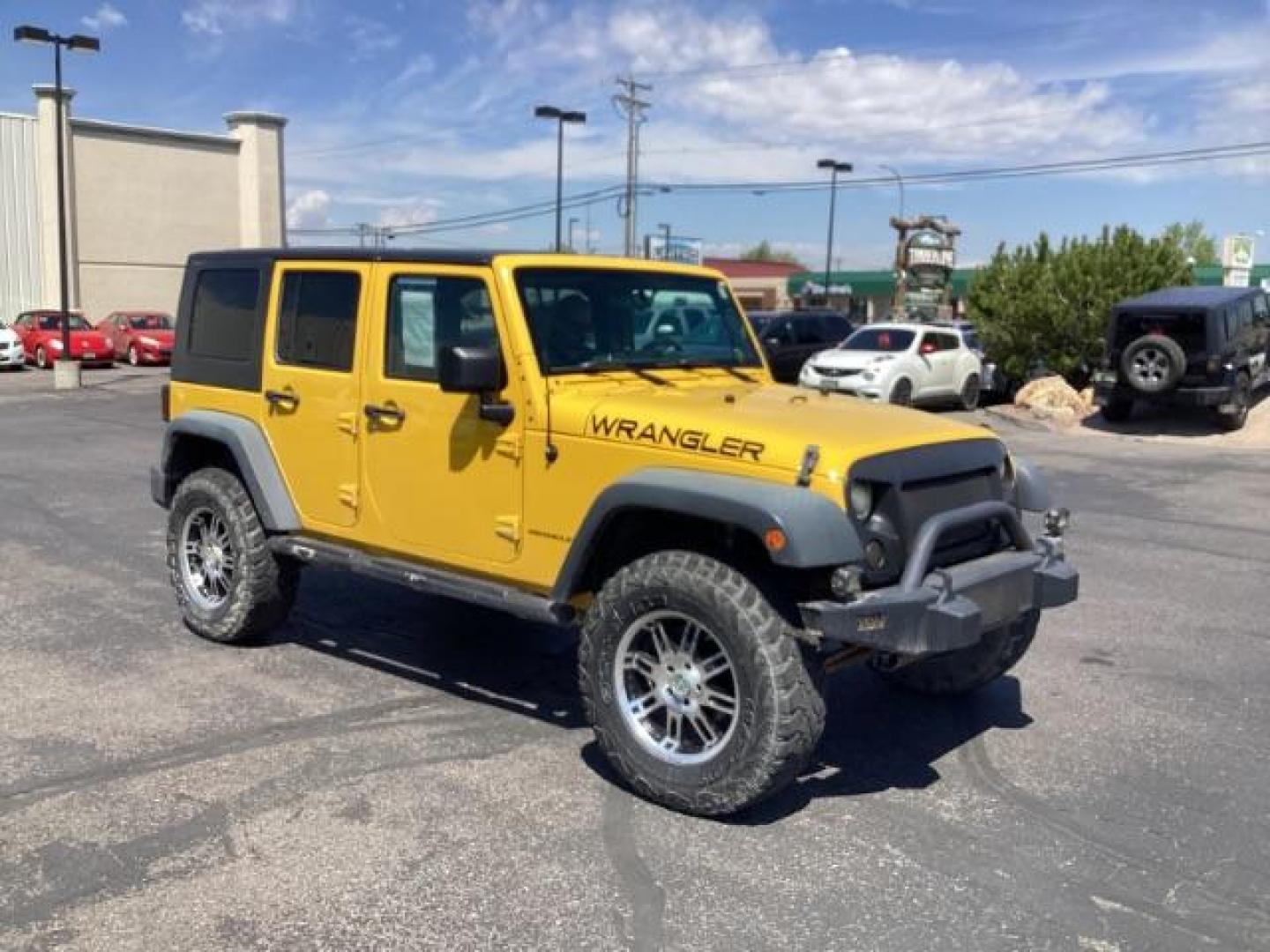 2008 YELLOW Jeep Wrangler Unlimited X 4WD (1J4GA39198L) with an 3.8L V6 OHV 12V engine, located at 1235 N Woodruff Ave., Idaho Falls, 83401, (208) 523-1053, 43.507172, -112.000488 - Photo#6