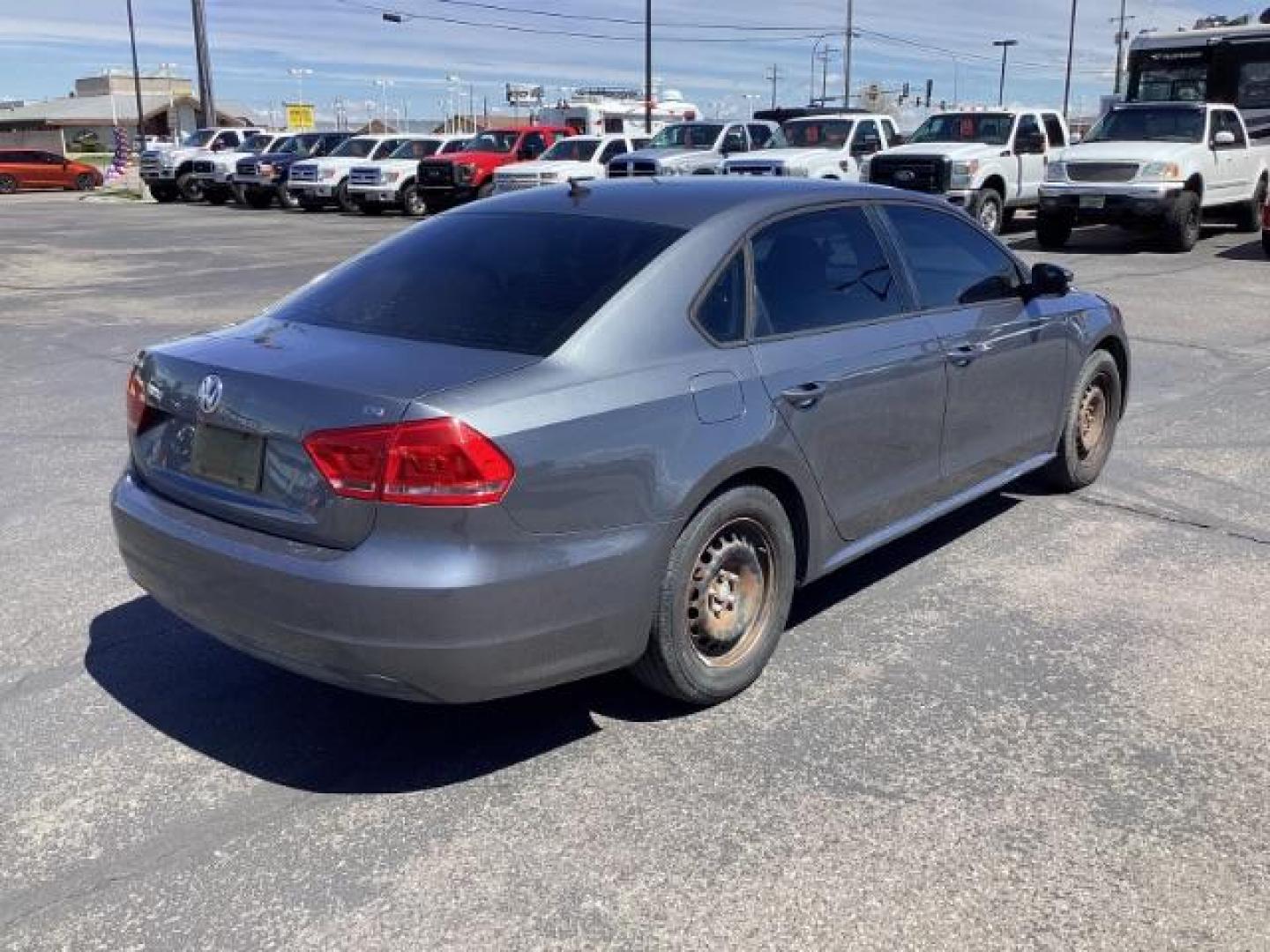 2015 GREY Volkswagen Passat NA (1VWAT7A34FC) , located at 1235 N Woodruff Ave., Idaho Falls, 83401, (208) 523-1053, 43.507172, -112.000488 - The 2015 Volkswagen Passat TSI is a midsize sedan that offers a comfortable ride, spacious interior, and a range of available features. Here's a rundown of its key features: Engine: The Passat TSI is powered by a turbocharged 1.8-liter four-cylinder engine, producing around 170 horsepower and 184 l - Photo#4