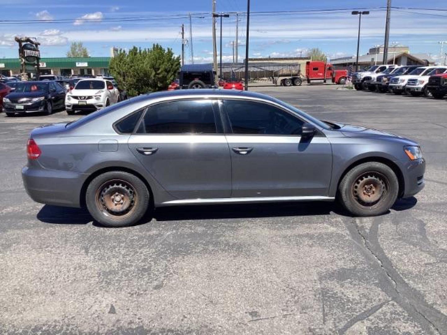 2015 GREY Volkswagen Passat NA (1VWAT7A34FC) , located at 1235 N Woodruff Ave., Idaho Falls, 83401, (208) 523-1053, 43.507172, -112.000488 - The 2015 Volkswagen Passat TSI is a midsize sedan that offers a comfortable ride, spacious interior, and a range of available features. Here's a rundown of its key features: Engine: The Passat TSI is powered by a turbocharged 1.8-liter four-cylinder engine, producing around 170 horsepower and 184 l - Photo#5