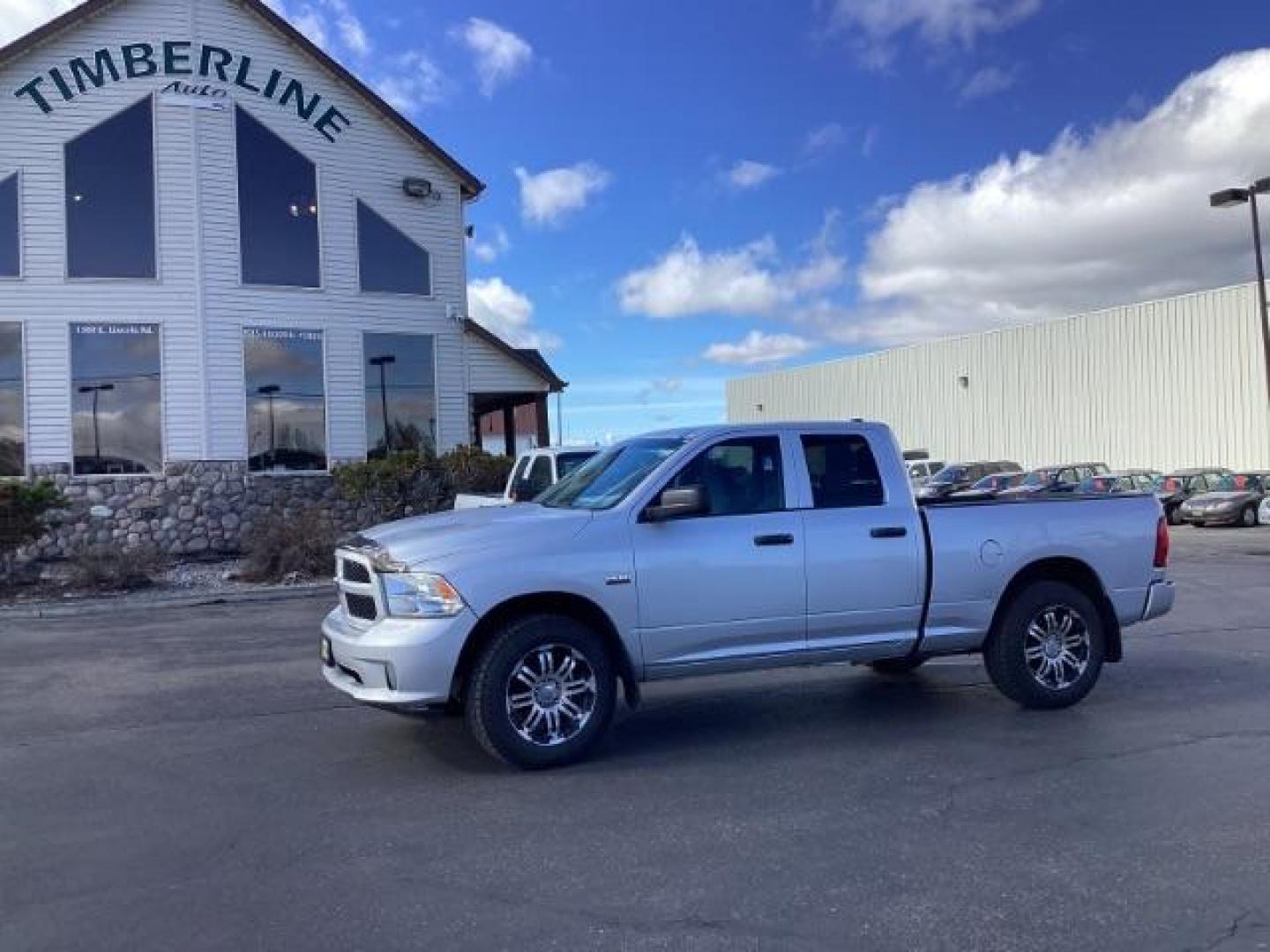 2013 Bright Silver Metallic /Black/Diesel Gray Cloth Interior RAM 1500 Tradesman Quad Cab 4WD (1C6RR7FT4DS) with an 5.7L V8 OHV 16V engine, 6-Speed Automatic transmission, located at 1235 N Woodruff Ave., Idaho Falls, 83401, (208) 523-1053, 43.507172, -112.000488 - New Inventory. Call for more pictures. At Timberline Auto it is always easy to find a great deal on your next vehicle! Our experienced sales staff can help find the right vehicle will fit your needs. Our knowledgeable finance department has options for almost any credit score. We offer many warranty - Photo#0