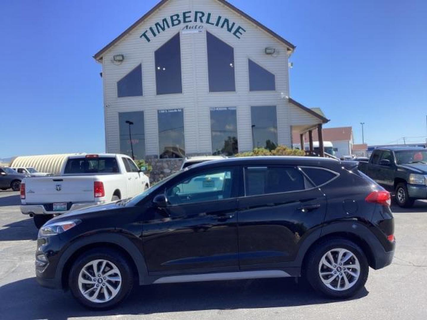 2018 Black Noir Pearl /Black, cloth Hyundai Tucson SEL AWD (KM8J3CA40JU) with an 2.0L L4 DOHC 16V engine, 6-Speed Automatic transmission, located at 1235 N Woodruff Ave., Idaho Falls, 83401, (208) 523-1053, 43.507172, -112.000488 - At Timberline Auto it is always easy to find a great deal on your next vehicle! Our experienced sales staff can help find the right vehicle will fit your needs. Our knowledgeable finance department has options for almost any credit score. We offer many warranty contract options to protect you new pr - Photo#1