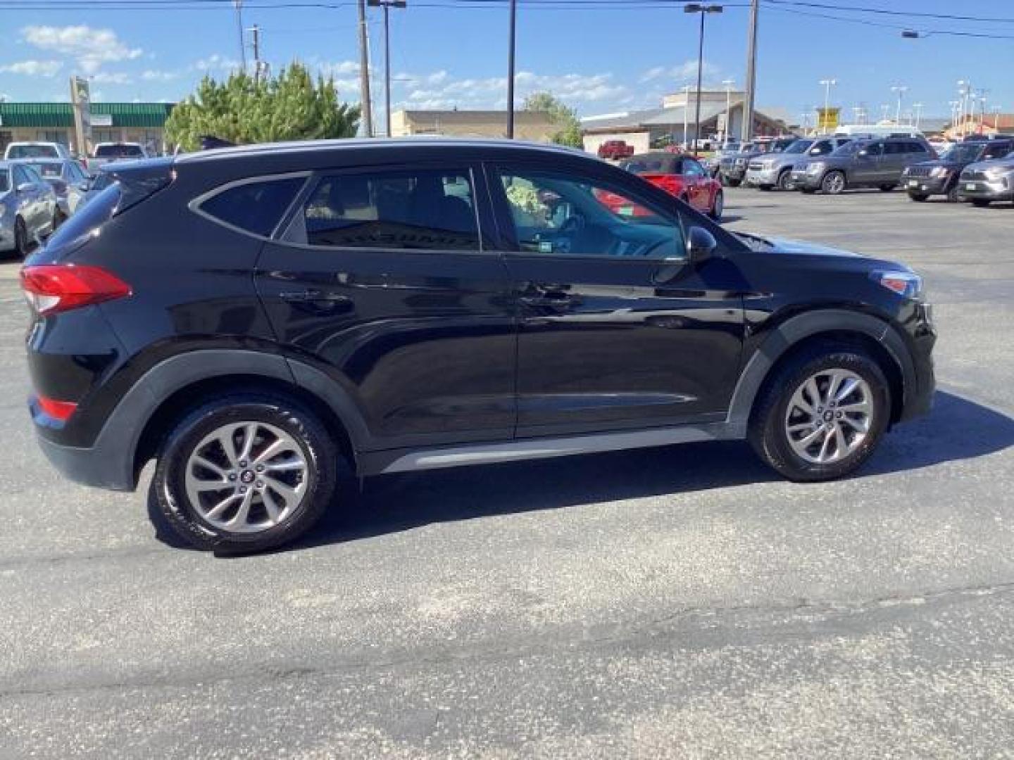 2018 Black Noir Pearl /Black, cloth Hyundai Tucson SEL AWD (KM8J3CA40JU) with an 2.0L L4 DOHC 16V engine, 6-Speed Automatic transmission, located at 1235 N Woodruff Ave., Idaho Falls, 83401, (208) 523-1053, 43.507172, -112.000488 - At Timberline Auto it is always easy to find a great deal on your next vehicle! Our experienced sales staff can help find the right vehicle will fit your needs. Our knowledgeable finance department has options for almost any credit score. We offer many warranty contract options to protect you new pr - Photo#2