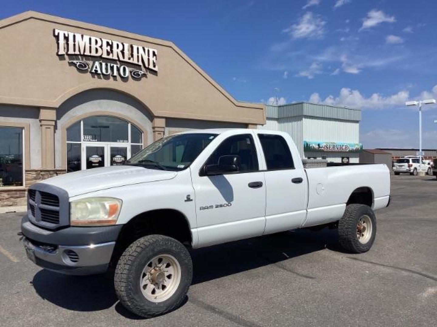 2006 Bright White /Medium Slate Gray Cloth Interior Dodge Ram 2500 ST Quad Cab Long Bed 4WD (1D7KS28C96J) with an 5.9L L6 OHV 24V TURBO DIESEL engine, 5-Speed Automatic transmission, located at 1235 N Woodruff Ave., Idaho Falls, 83401, (208) 523-1053, 43.507172, -112.000488 - Photo#0