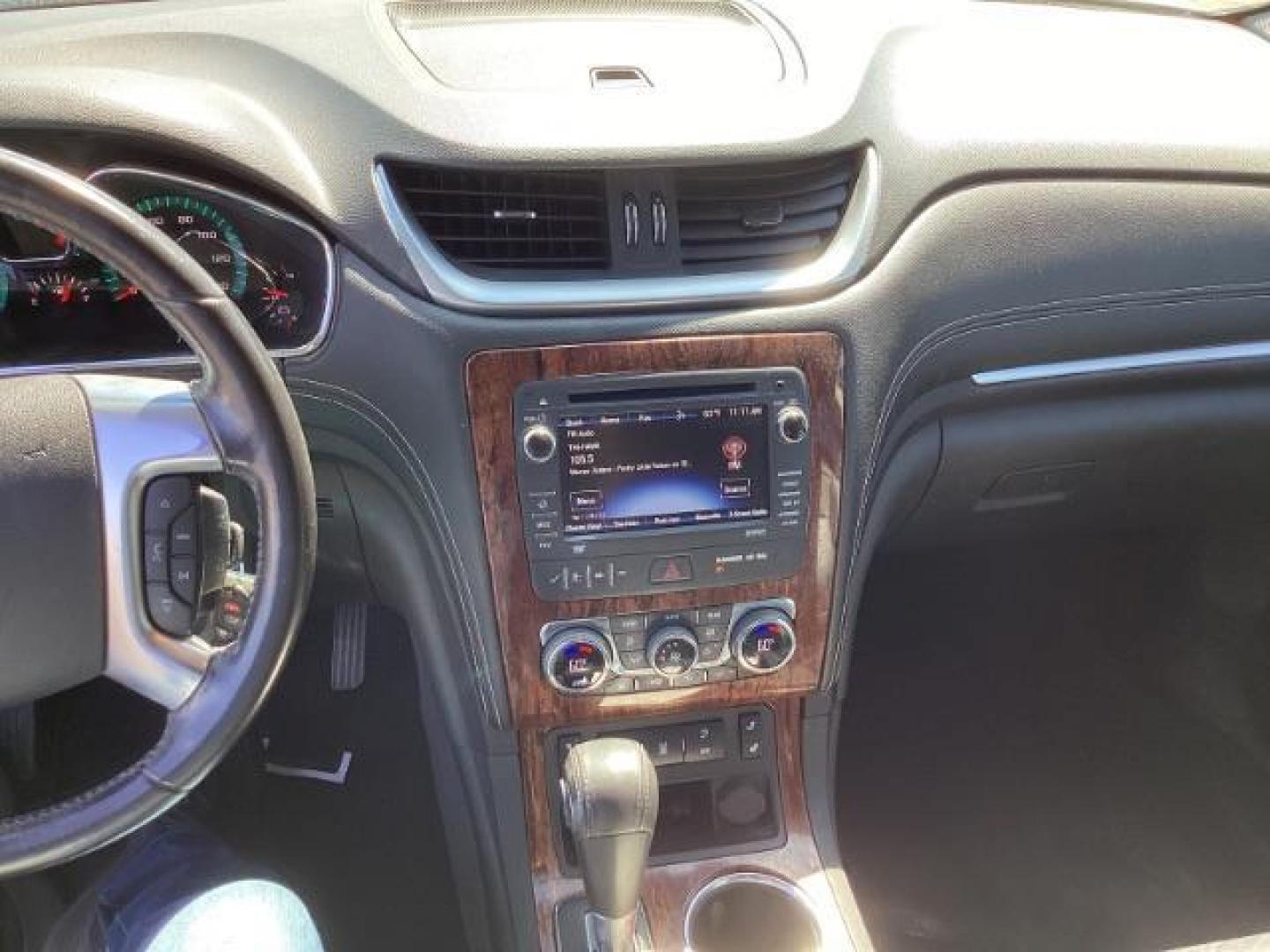 2014 White Diamond Tricoat /Ebony Chevrolet Traverse 2LT AWD (1GNKVHKD1EJ) with an 3.6L V6 DOHC 24V engine, 6-Speed Automatic transmission, located at 1235 N Woodruff Ave., Idaho Falls, 83401, (208) 523-1053, 43.507172, -112.000488 - The 2014 Chevrolet Traverse 2LT AWD is a midsize SUV known for its spacious interior, comfortable ride, and ample cargo space. Here are some of its key features: Engine: It typically comes with a 3.6-liter V6 engine that produces around 281 horsepower, paired with a 6-speed automatic transmission. - Photo#10