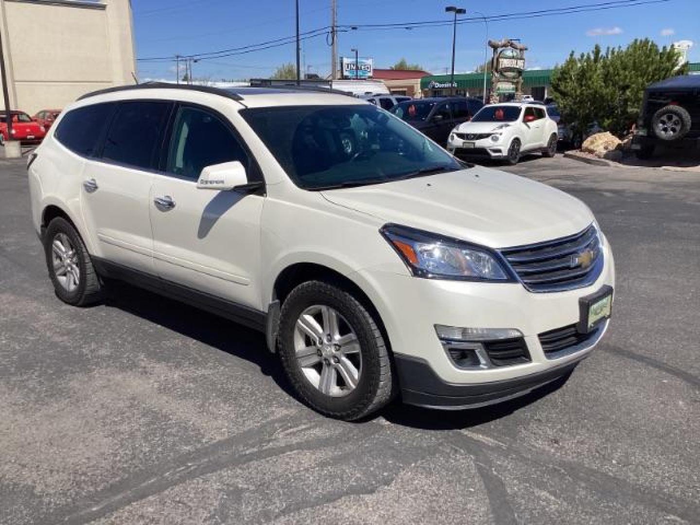 2014 White Diamond Tricoat /Ebony Chevrolet Traverse 2LT AWD (1GNKVHKD1EJ) with an 3.6L V6 DOHC 24V engine, 6-Speed Automatic transmission, located at 1235 N Woodruff Ave., Idaho Falls, 83401, (208) 523-1053, 43.507172, -112.000488 - The 2014 Chevrolet Traverse 2LT AWD is a midsize SUV known for its spacious interior, comfortable ride, and ample cargo space. Here are some of its key features: Engine: It typically comes with a 3.6-liter V6 engine that produces around 281 horsepower, paired with a 6-speed automatic transmission. - Photo#6