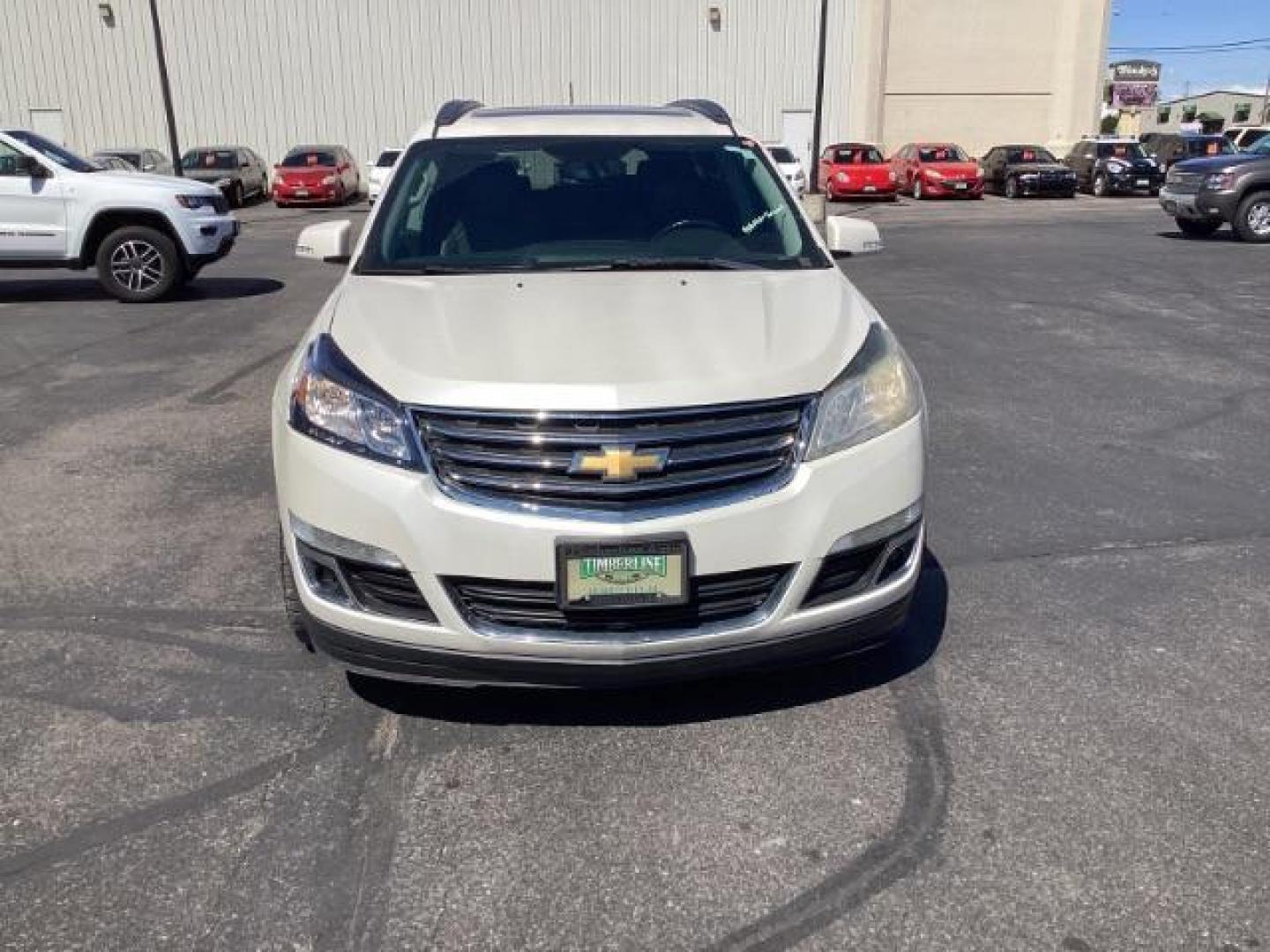 2014 White Diamond Tricoat /Ebony Chevrolet Traverse 2LT AWD (1GNKVHKD1EJ) with an 3.6L V6 DOHC 24V engine, 6-Speed Automatic transmission, located at 1235 N Woodruff Ave., Idaho Falls, 83401, (208) 523-1053, 43.507172, -112.000488 - The 2014 Chevrolet Traverse 2LT AWD is a midsize SUV known for its spacious interior, comfortable ride, and ample cargo space. Here are some of its key features: Engine: It typically comes with a 3.6-liter V6 engine that produces around 281 horsepower, paired with a 6-speed automatic transmission. - Photo#7