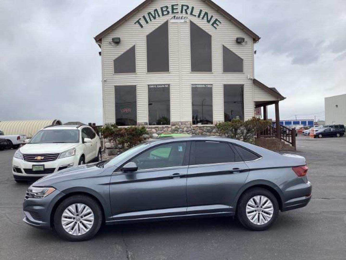 2019 Platinum Gray Metallic Volkswagen Jetta 1.4T S 8A (3VWC57BU6KM) with an 1.4L L4 DOHC 16V engine, 8-Speed Automatic transmission, located at 1235 N Woodruff Ave., Idaho Falls, 83401, (208) 523-1053, 43.507172, -112.000488 - The 2019 Volkswagen Jetta S comes with a variety of features that make it a popular choice among drivers. Here are some of its key features: 1.4-Liter Turbocharged Engine: The Jetta S is powered by a 1.4-liter turbocharged four-cylinder engine, providing a good balance of power and fuel efficiency. - Photo#1