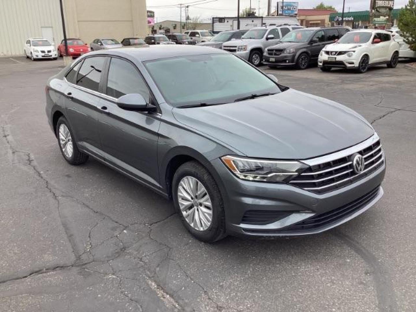 2019 Platinum Gray Metallic Volkswagen Jetta 1.4T S 8A (3VWC57BU6KM) with an 1.4L L4 DOHC 16V engine, 8-Speed Automatic transmission, located at 1235 N Woodruff Ave., Idaho Falls, 83401, (208) 523-1053, 43.507172, -112.000488 - The 2019 Volkswagen Jetta S comes with a variety of features that make it a popular choice among drivers. Here are some of its key features: 1.4-Liter Turbocharged Engine: The Jetta S is powered by a 1.4-liter turbocharged four-cylinder engine, providing a good balance of power and fuel efficiency. - Photo#5