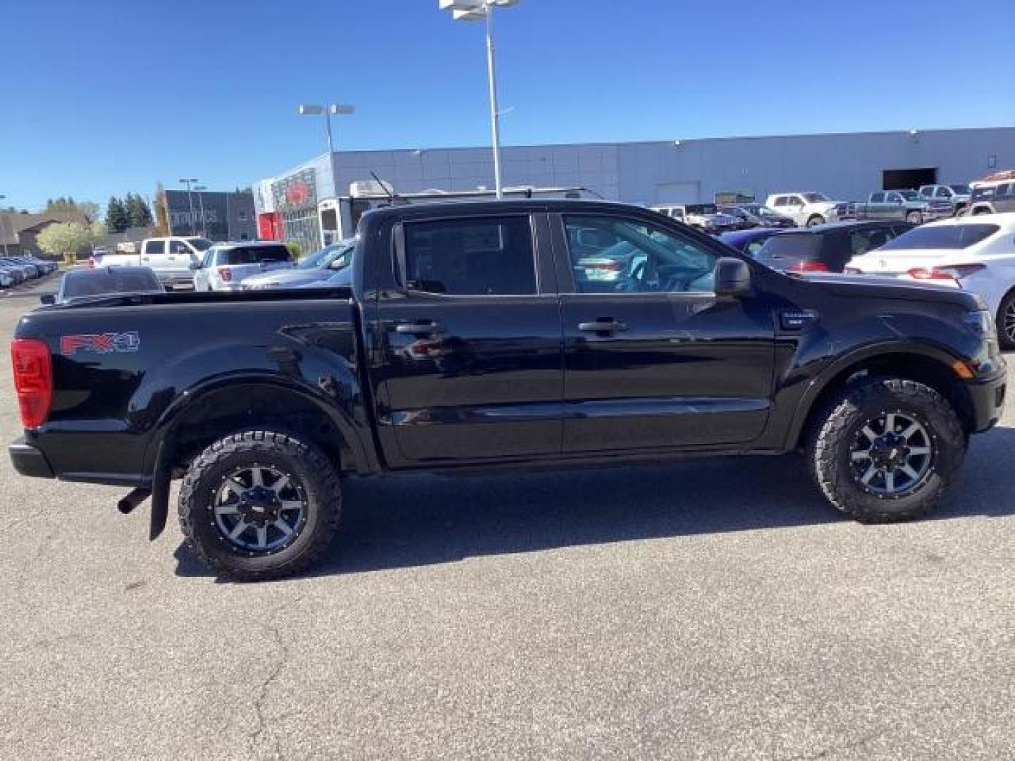 2019 Shadow Black /Medium Stone, premium cloth Ford Ranger XLT SuperCrew 4WD (1FTER4FH0KL) with an 2.3L L4 DOHC 16V engine, 10-Speed Automatic transmission, located at 1235 N Woodruff Ave., Idaho Falls, 83401, (208) 523-1053, 43.507172, -112.000488 - Photo#5