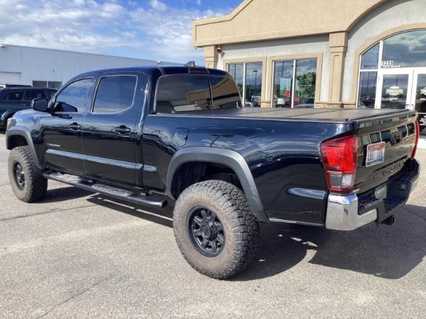 2019 Midnight Black Metallic /Cement Gray, cloth Toyota Tacoma SR5 Double Cab Super Long Bed V6 6AT 4WD (3TMDZ5BN7KM) with an 3.5L V6 DOHC 24V engine, 6-Speed Automatic transmission, located at 1235 N Woodruff Ave., Idaho Falls, 83401, (208) 523-1053, 43.507172, -112.000488 - Photo#4