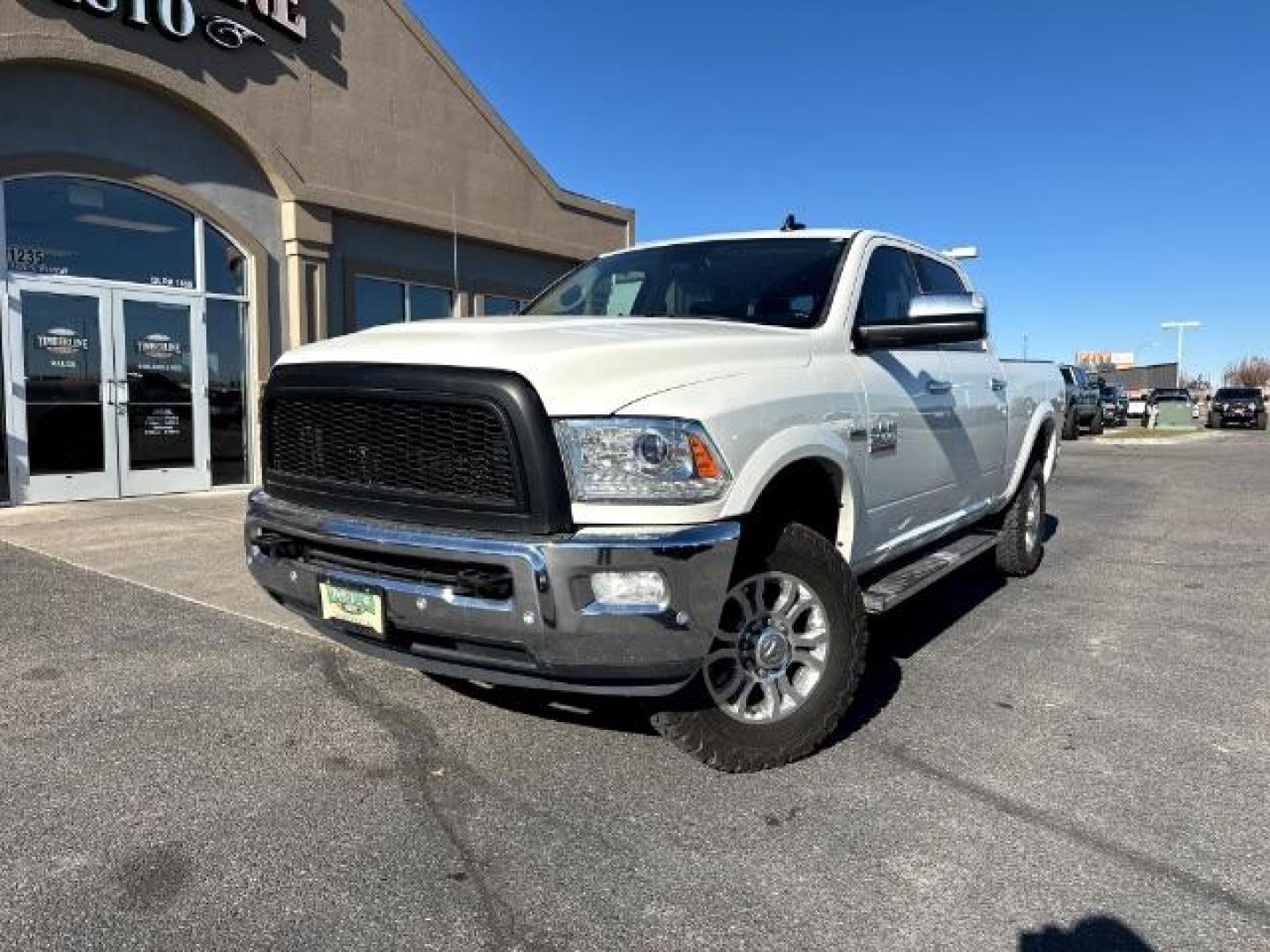 2017 WHITE /Canyon Brown/Light Frost Beige, leather RAM 2500 Laramie Crew Cab SWB 4WD (3C6UR5FJ6HG) with an 6.4L V8 engine, 6-Speed Automatic transmission, located at 1235 N Woodruff Ave., Idaho Falls, 83401, (208) 523-1053, 43.507172, -112.000488 - Photo#1