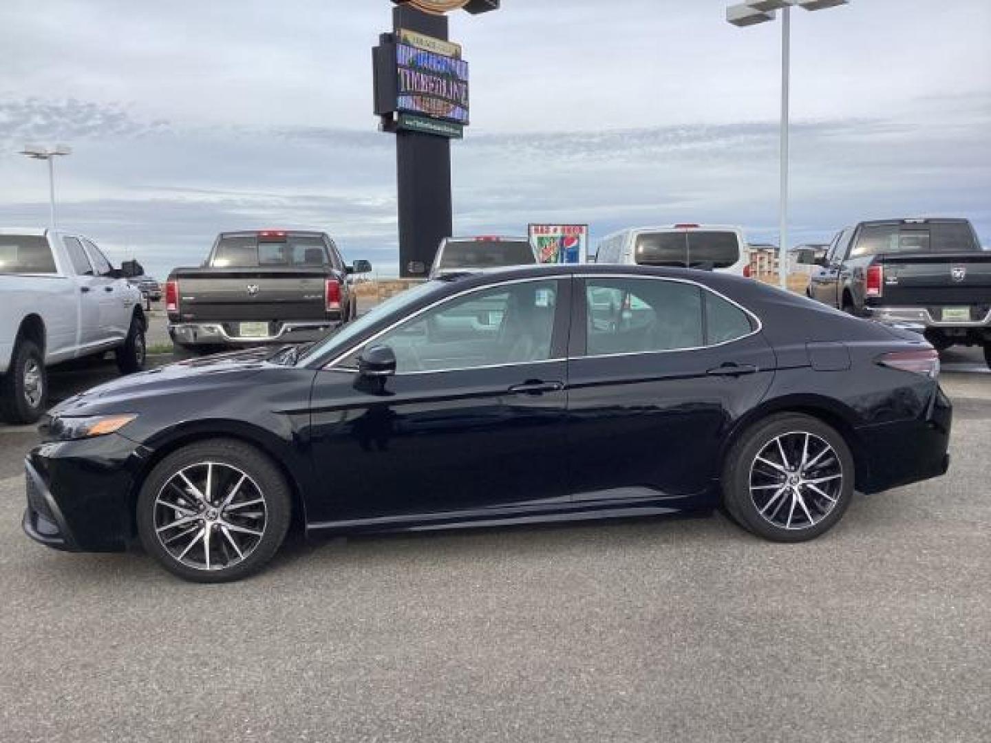 2023 Midnight Black Metallic /Black Toyota Camry SE (4T1G11AKXPU) with an 2.5L L4 DOHC 16V engine, 8-Speed Automatic transmission, located at 1235 N Woodruff Ave., Idaho Falls, 83401, (208) 523-1053, 43.507172, -112.000488 - Photo#2