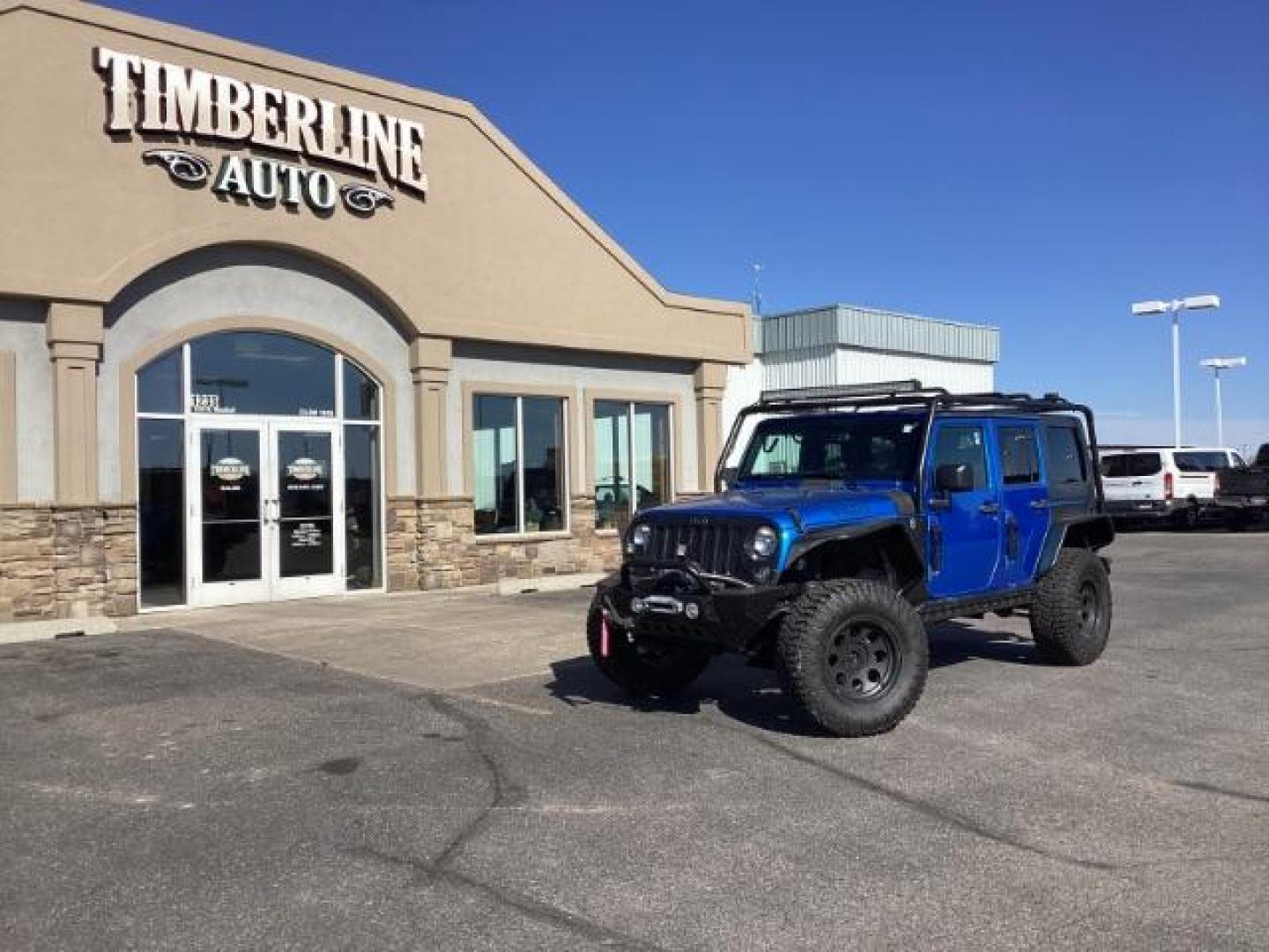 2016 Hydro Blue Pearl Coat /Black, cloth Jeep Wrangler Unlimited Sport 4WD (1C4BJWDG6GL) with an 3.6L V6 DOHC 24V FFV engine, 6-Speed Manual transmission, located at 1235 N Woodruff Ave., Idaho Falls, 83401, (208) 523-1053, 43.507172, -112.000488 - Photo#0