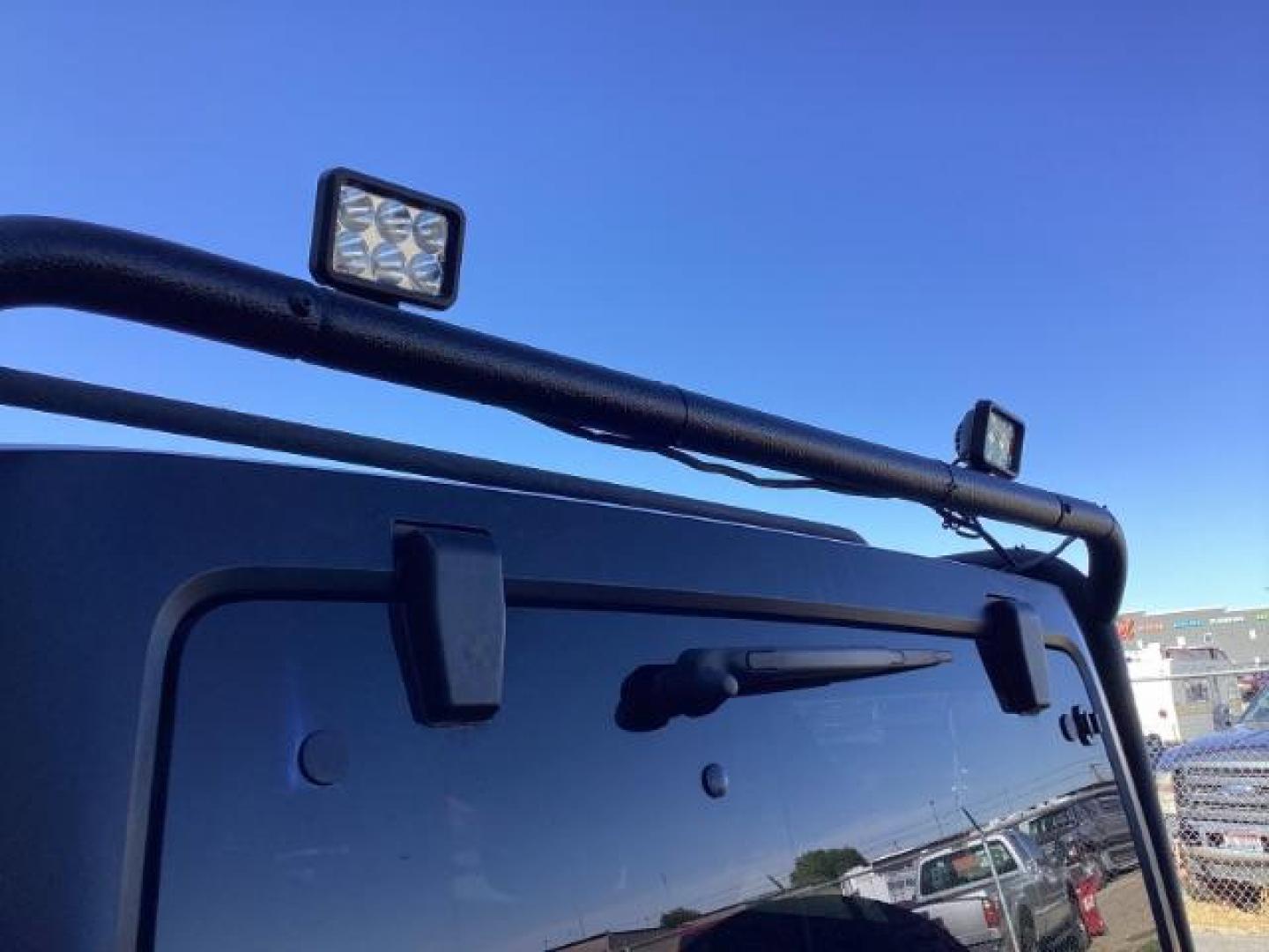 2016 Hydro Blue Pearl Coat /Black, cloth Jeep Wrangler Unlimited Sport 4WD (1C4BJWDG6GL) with an 3.6L V6 DOHC 24V FFV engine, 6-Speed Manual transmission, located at 1235 N Woodruff Ave., Idaho Falls, 83401, (208) 523-1053, 43.507172, -112.000488 - Photo#12