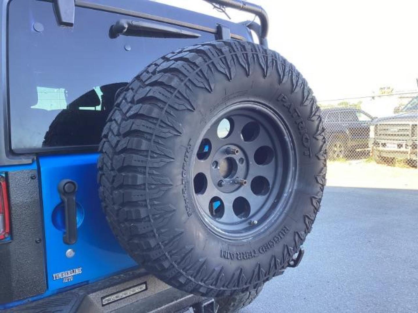 2016 Hydro Blue Pearl Coat /Black, cloth Jeep Wrangler Unlimited Sport 4WD (1C4BJWDG6GL) with an 3.6L V6 DOHC 24V FFV engine, 6-Speed Manual transmission, located at 1235 N Woodruff Ave., Idaho Falls, 83401, (208) 523-1053, 43.507172, -112.000488 - Photo#13