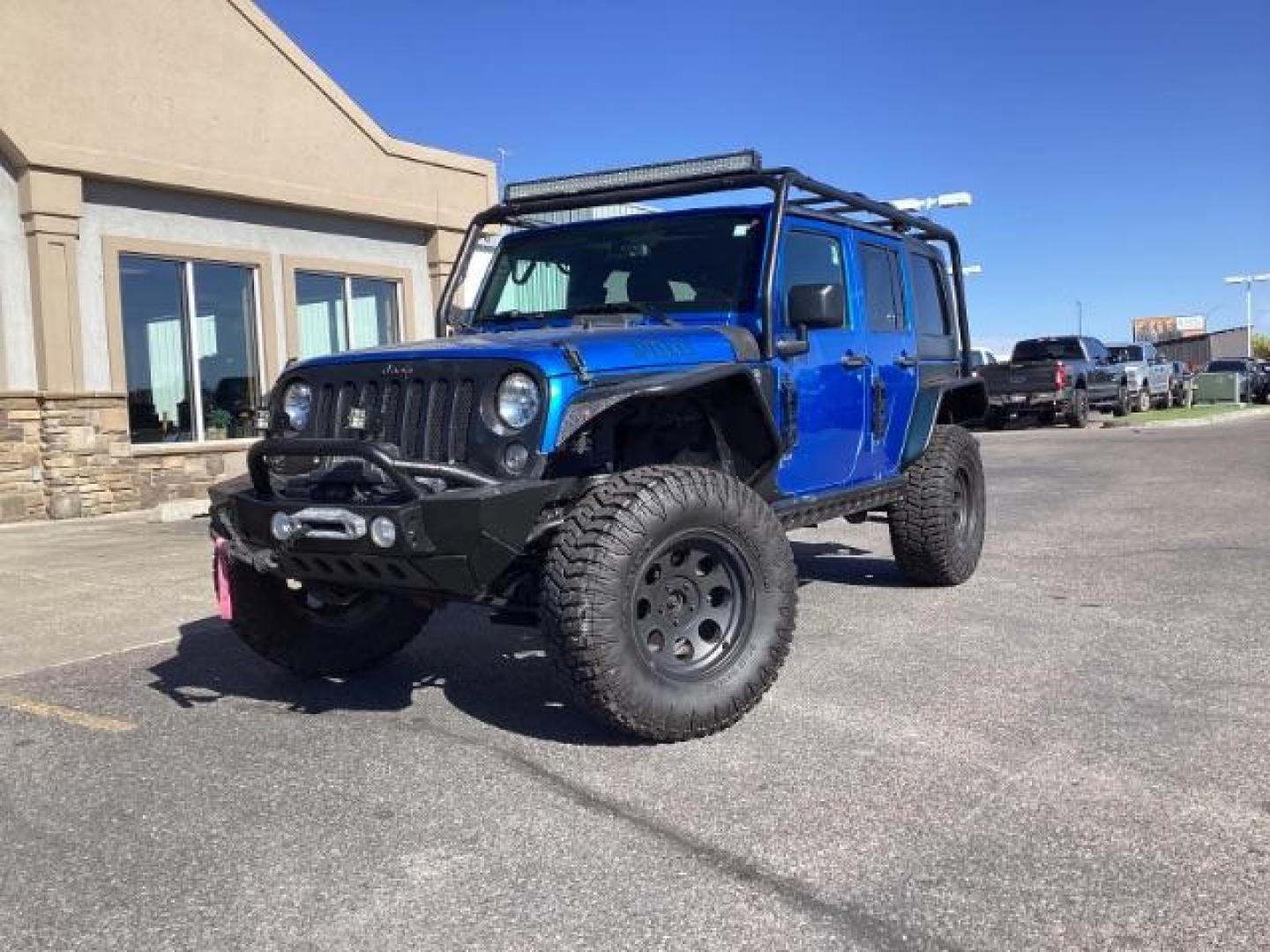 2016 Hydro Blue Pearl Coat /Black, cloth Jeep Wrangler Unlimited Sport 4WD (1C4BJWDG6GL) with an 3.6L V6 DOHC 24V FFV engine, 6-Speed Manual transmission, located at 1235 N Woodruff Ave., Idaho Falls, 83401, (208) 523-1053, 43.507172, -112.000488 - Photo#1