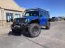 2016 Hydro Blue Pearl Coat /Black, cloth Jeep Wrangler Unlimited Sport 4WD (1C4BJWDG6GL) with an 3.6L V6 DOHC 24V FFV engine, 6-Speed Manual transmission, located at 1235 N Woodruff Ave., Idaho Falls, 83401, (208) 523-1053, 43.507172, -112.000488 - Photo#1