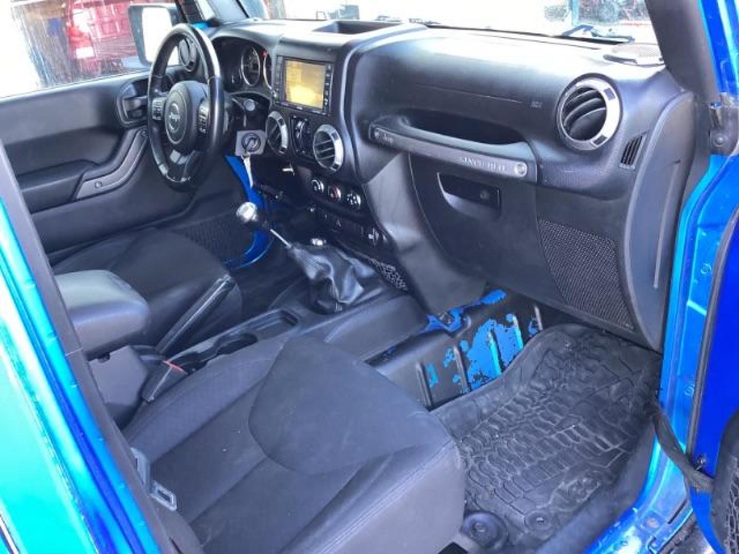 2016 Hydro Blue Pearl Coat /Black, cloth Jeep Wrangler Unlimited Sport 4WD (1C4BJWDG6GL) with an 3.6L V6 DOHC 24V FFV engine, 6-Speed Manual transmission, located at 1235 N Woodruff Ave., Idaho Falls, 83401, (208) 523-1053, 43.507172, -112.000488 - Photo#30