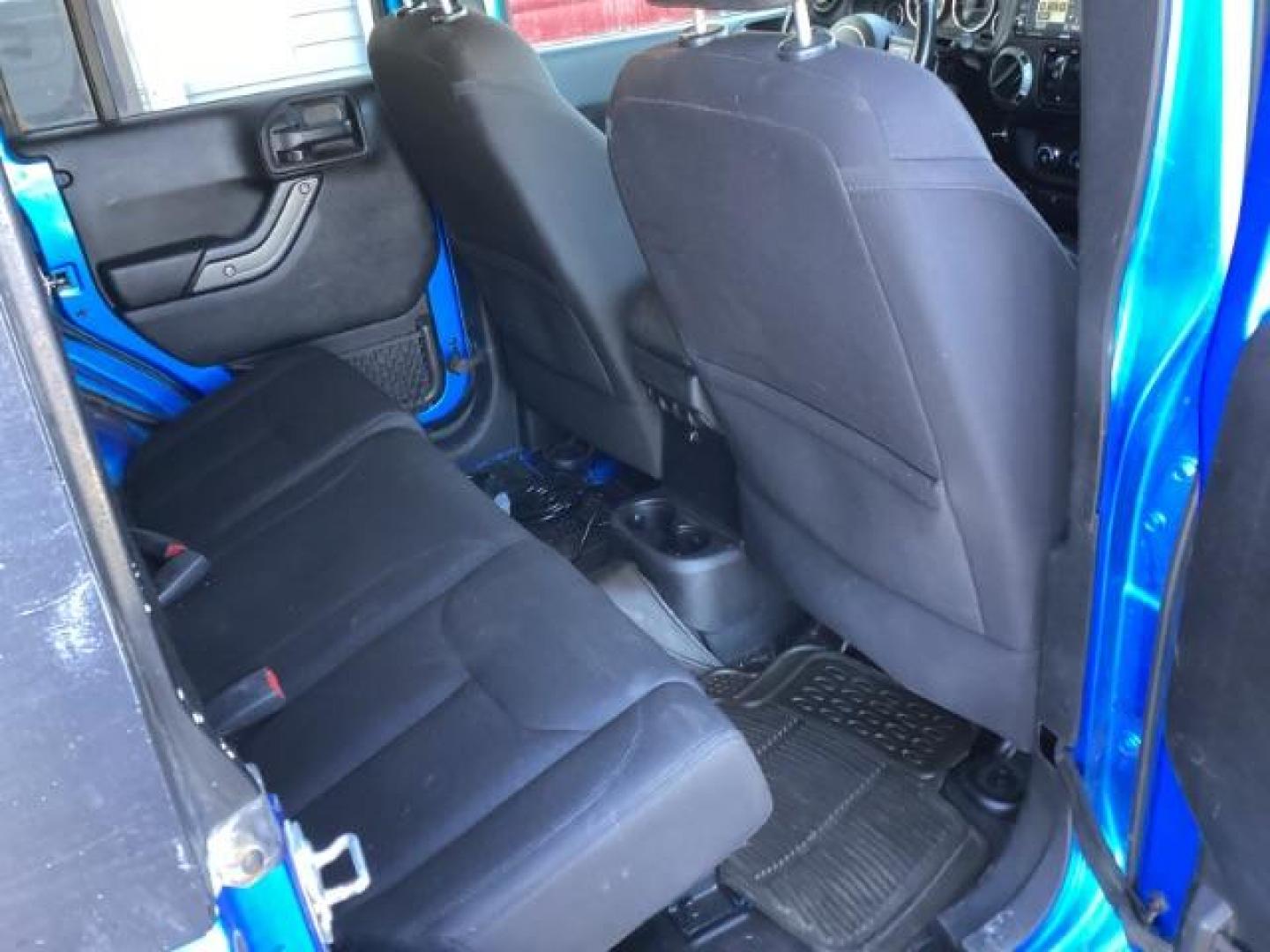 2016 Hydro Blue Pearl Coat /Black, cloth Jeep Wrangler Unlimited Sport 4WD (1C4BJWDG6GL) with an 3.6L V6 DOHC 24V FFV engine, 6-Speed Manual transmission, located at 1235 N Woodruff Ave., Idaho Falls, 83401, (208) 523-1053, 43.507172, -112.000488 - Photo#31