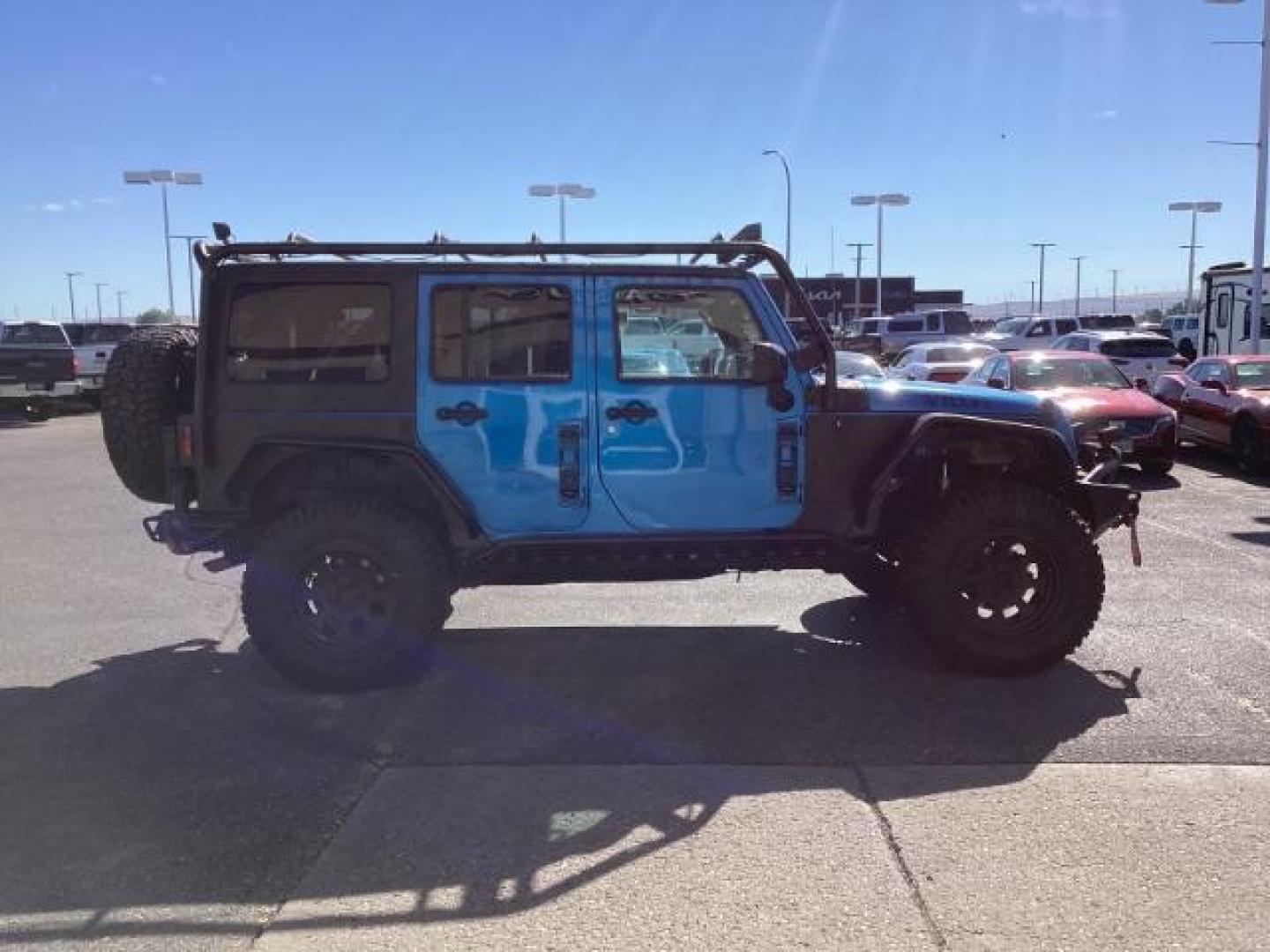 2016 Hydro Blue Pearl Coat /Black, cloth Jeep Wrangler Unlimited Sport 4WD (1C4BJWDG6GL) with an 3.6L V6 DOHC 24V FFV engine, 6-Speed Manual transmission, located at 1235 N Woodruff Ave., Idaho Falls, 83401, (208) 523-1053, 43.507172, -112.000488 - Photo#6