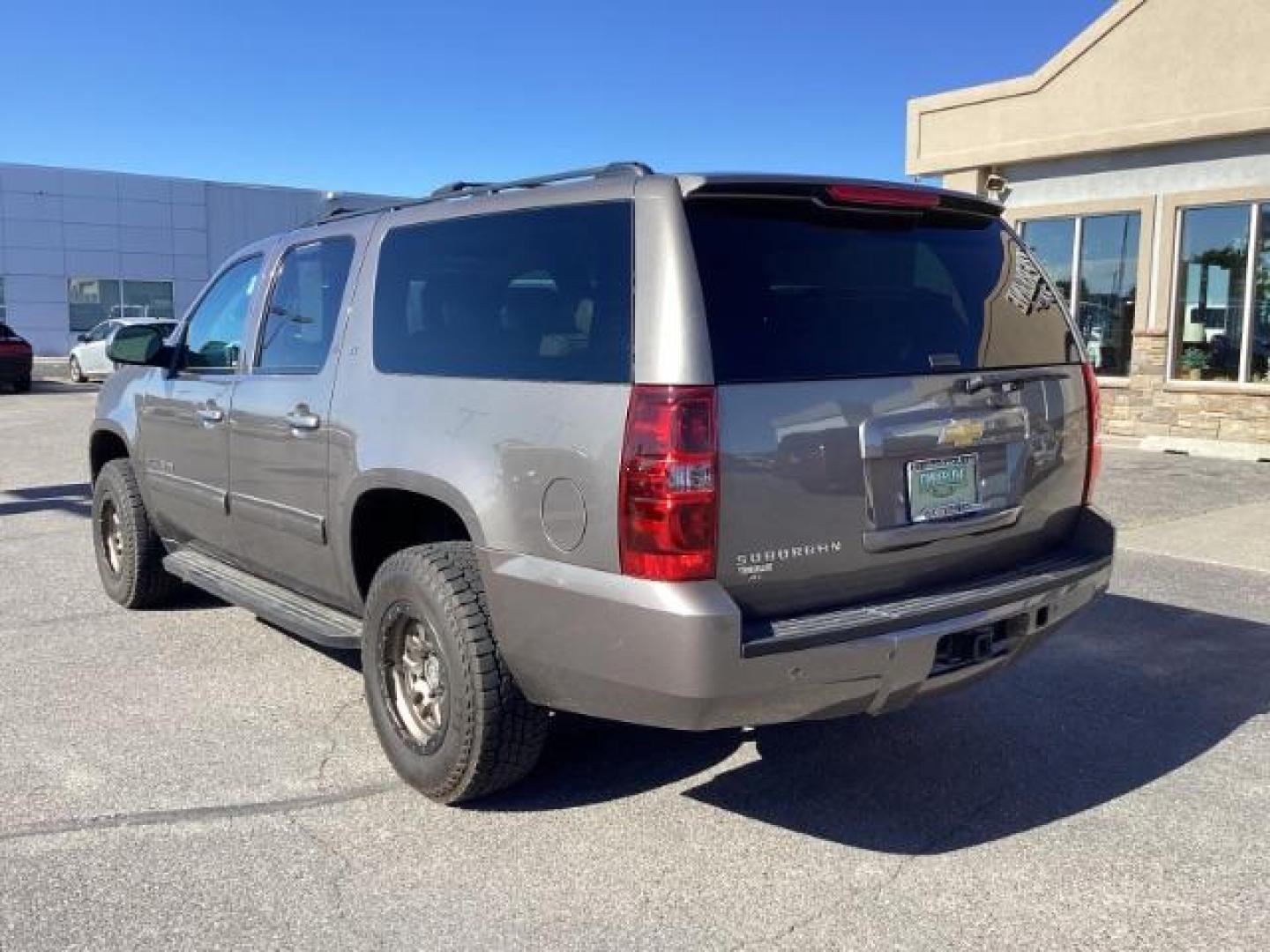 2013 GRAY /Ebony Leather Interior Chevrolet Suburban LTZ 1500 4WD (1GNSKJE71DR) with an 5.3L V8 OHV 16V FFV engine, 6-Speed Automatic transmission, located at 1235 N Woodruff Ave., Idaho Falls, 83401, (208) 523-1053, 43.507172, -112.000488 - Photo#2