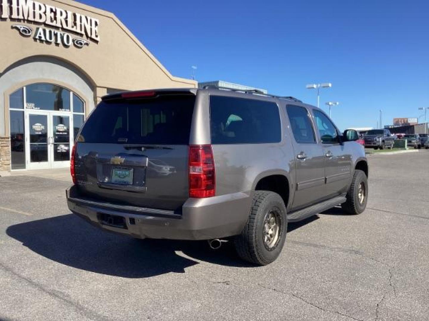 2013 GRAY /Ebony Leather Interior Chevrolet Suburban LTZ 1500 4WD (1GNSKJE71DR) with an 5.3L V8 OHV 16V FFV engine, 6-Speed Automatic transmission, located at 1235 N Woodruff Ave., Idaho Falls, 83401, (208) 523-1053, 43.507172, -112.000488 - Photo#4