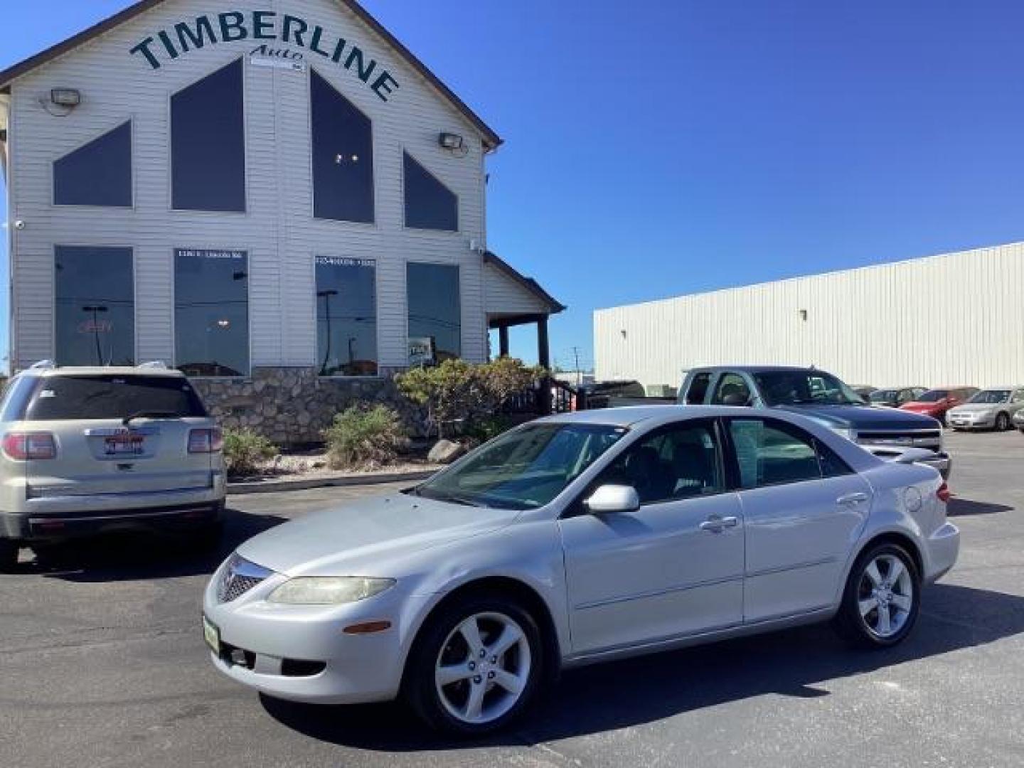 2005 Glacier Silver Metallic /Two-Tone Gray Cloth Seats Mazda Mazda6 i (1YVFP80C955) with an 2.3L L4 DOHC 16V engine, located at 1235 N Woodruff Ave., Idaho Falls, 83401, (208) 523-1053, 43.507172, -112.000488 - The 2005 Mazda 6 i was a well-rounded midsize sedan offering a mix of sporty performance, comfortable interior, and practical features. Here is a comprehensive overview of the features available on the 2005 Mazda 6 i:Engine: 2.3-liter DOHC 16-valve inline-4,Seating: Cloth upholstery ,Seats: 5-passen - Photo#0