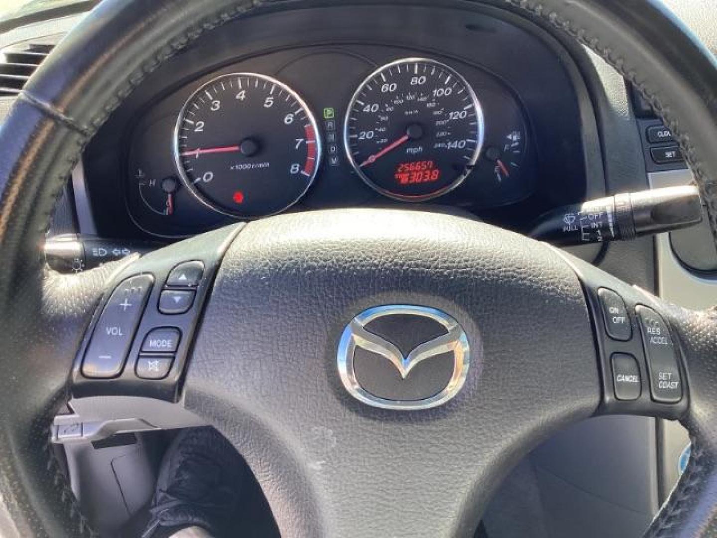 2005 Glacier Silver Metallic /Two-Tone Gray Cloth Seats Mazda Mazda6 i (1YVFP80C955) with an 2.3L L4 DOHC 16V engine, located at 1235 N Woodruff Ave., Idaho Falls, 83401, (208) 523-1053, 43.507172, -112.000488 - The 2005 Mazda 6 i was a well-rounded midsize sedan offering a mix of sporty performance, comfortable interior, and practical features. Here is a comprehensive overview of the features available on the 2005 Mazda 6 i:Engine: 2.3-liter DOHC 16-valve inline-4,Seating: Cloth upholstery ,Seats: 5-passen - Photo#10