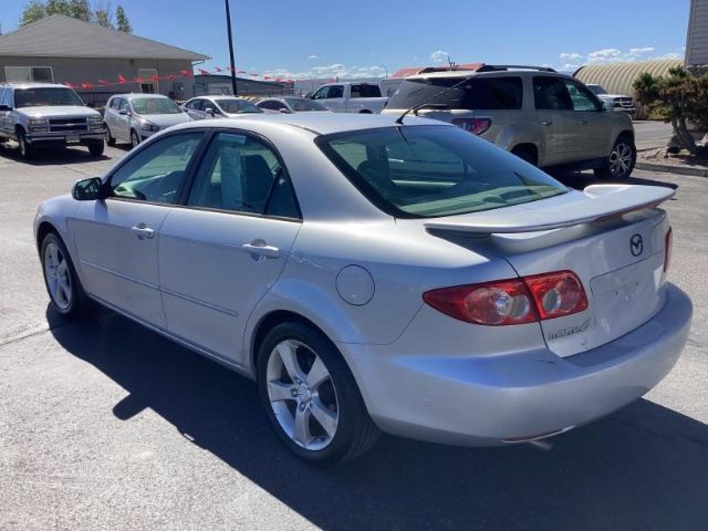 2005 Glacier Silver Metallic /Two-Tone Gray Cloth Seats Mazda Mazda6 i (1YVFP80C955) with an 2.3L L4 DOHC 16V engine, located at 1235 N Woodruff Ave., Idaho Falls, 83401, (208) 523-1053, 43.507172, -112.000488 - The 2005 Mazda 6 i was a well-rounded midsize sedan offering a mix of sporty performance, comfortable interior, and practical features. Here is a comprehensive overview of the features available on the 2005 Mazda 6 i:Engine: 2.3-liter DOHC 16-valve inline-4,Seating: Cloth upholstery ,Seats: 5-passen - Photo#2