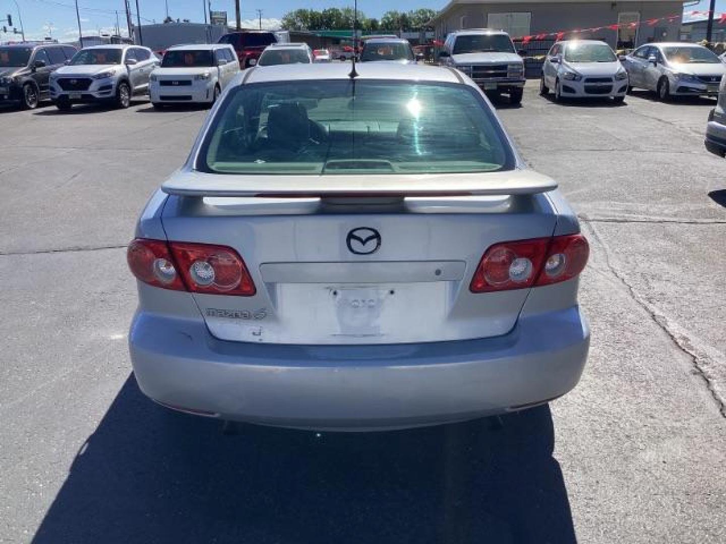 2005 Glacier Silver Metallic /Two-Tone Gray Cloth Seats Mazda Mazda6 i (1YVFP80C955) with an 2.3L L4 DOHC 16V engine, located at 1235 N Woodruff Ave., Idaho Falls, 83401, (208) 523-1053, 43.507172, -112.000488 - The 2005 Mazda 6 i was a well-rounded midsize sedan offering a mix of sporty performance, comfortable interior, and practical features. Here is a comprehensive overview of the features available on the 2005 Mazda 6 i:Engine: 2.3-liter DOHC 16-valve inline-4,Seating: Cloth upholstery ,Seats: 5-passen - Photo#3