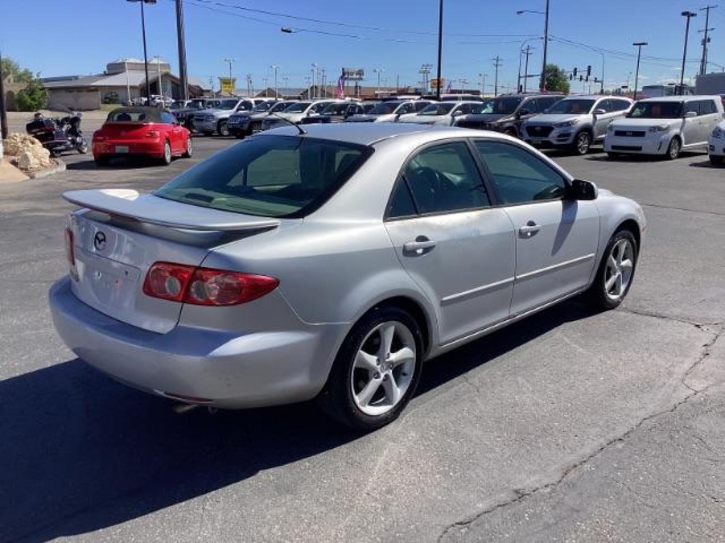 2005 Glacier Silver Metallic /Two-Tone Gray Cloth Seats Mazda Mazda6 i (1YVFP80C955) with an 2.3L L4 DOHC 16V engine, located at 1235 N Woodruff Ave., Idaho Falls, 83401, (208) 523-1053, 43.507172, -112.000488 - The 2005 Mazda 6 i was a well-rounded midsize sedan offering a mix of sporty performance, comfortable interior, and practical features. Here is a comprehensive overview of the features available on the 2005 Mazda 6 i:Engine: 2.3-liter DOHC 16-valve inline-4,Seating: Cloth upholstery ,Seats: 5-passen - Photo#4