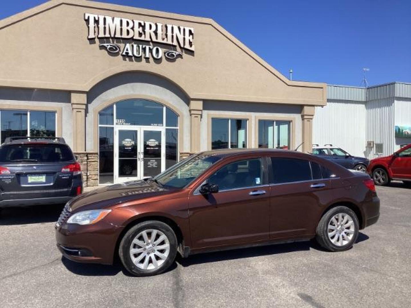 2013 Chrysler 200 SEDAN 4-DR (1C3CCBCG0DN) with an 3.6L V6 DOHC 24V FFV engine, 6-Speed Automatic transmission, located at 1235 N Woodruff Ave., Idaho Falls, 83401, (208) 523-1053, 43.507172, -112.000488 - Photo#0