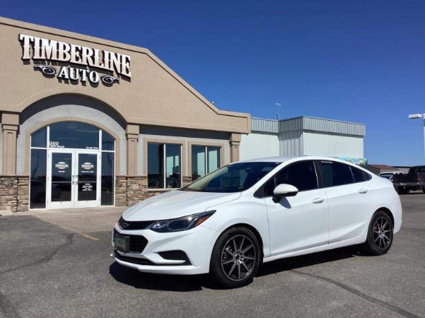 2017 Summit White /Jet Black, cloth Chevrolet Cruze LT Auto (1G1BE5SM0H7) with an 1.4L L4 DOHC 16V TURBO engine, 6-Speed Automatic transmission, located at 1235 N Woodruff Ave., Idaho Falls, 83401, (208) 523-1053, 43.507172, -112.000488 - Photo#0