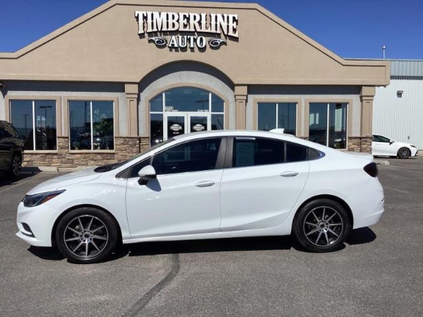 2017 Summit White /Jet Black, cloth Chevrolet Cruze LT Auto (1G1BE5SM0H7) with an 1.4L L4 DOHC 16V TURBO engine, 6-Speed Automatic transmission, located at 1235 N Woodruff Ave., Idaho Falls, 83401, (208) 523-1053, 43.507172, -112.000488 - Photo#1