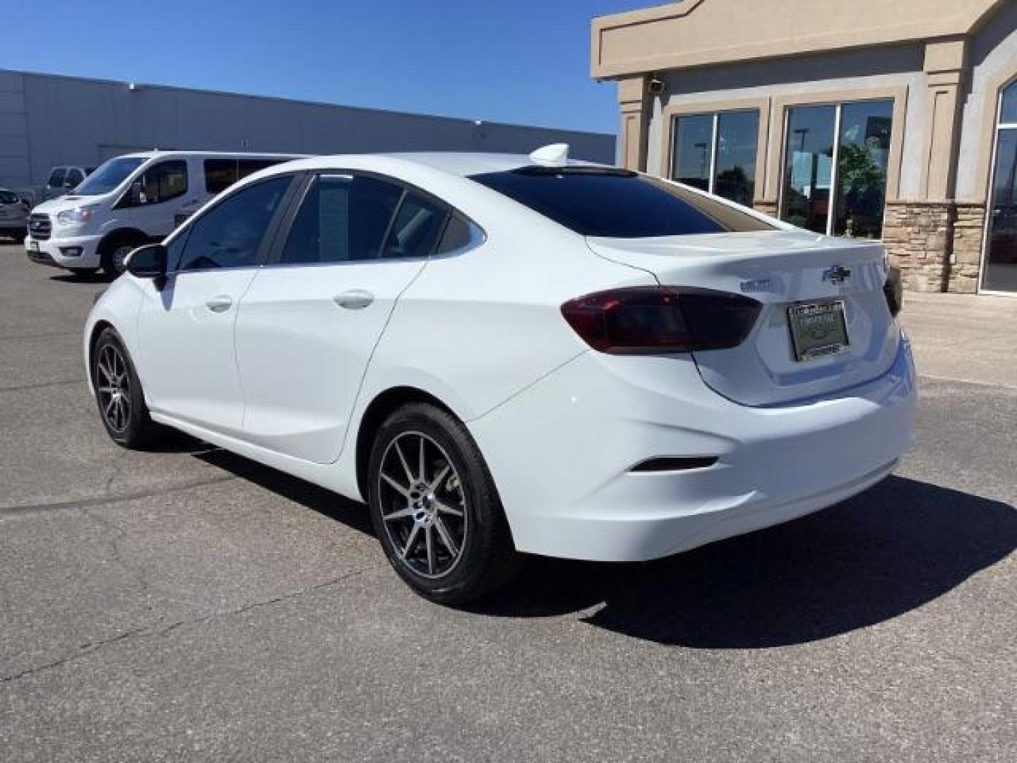 2017 Summit White /Jet Black, cloth Chevrolet Cruze LT Auto (1G1BE5SM0H7) with an 1.4L L4 DOHC 16V TURBO engine, 6-Speed Automatic transmission, located at 1235 N Woodruff Ave., Idaho Falls, 83401, (208) 523-1053, 43.507172, -112.000488 - Photo#2