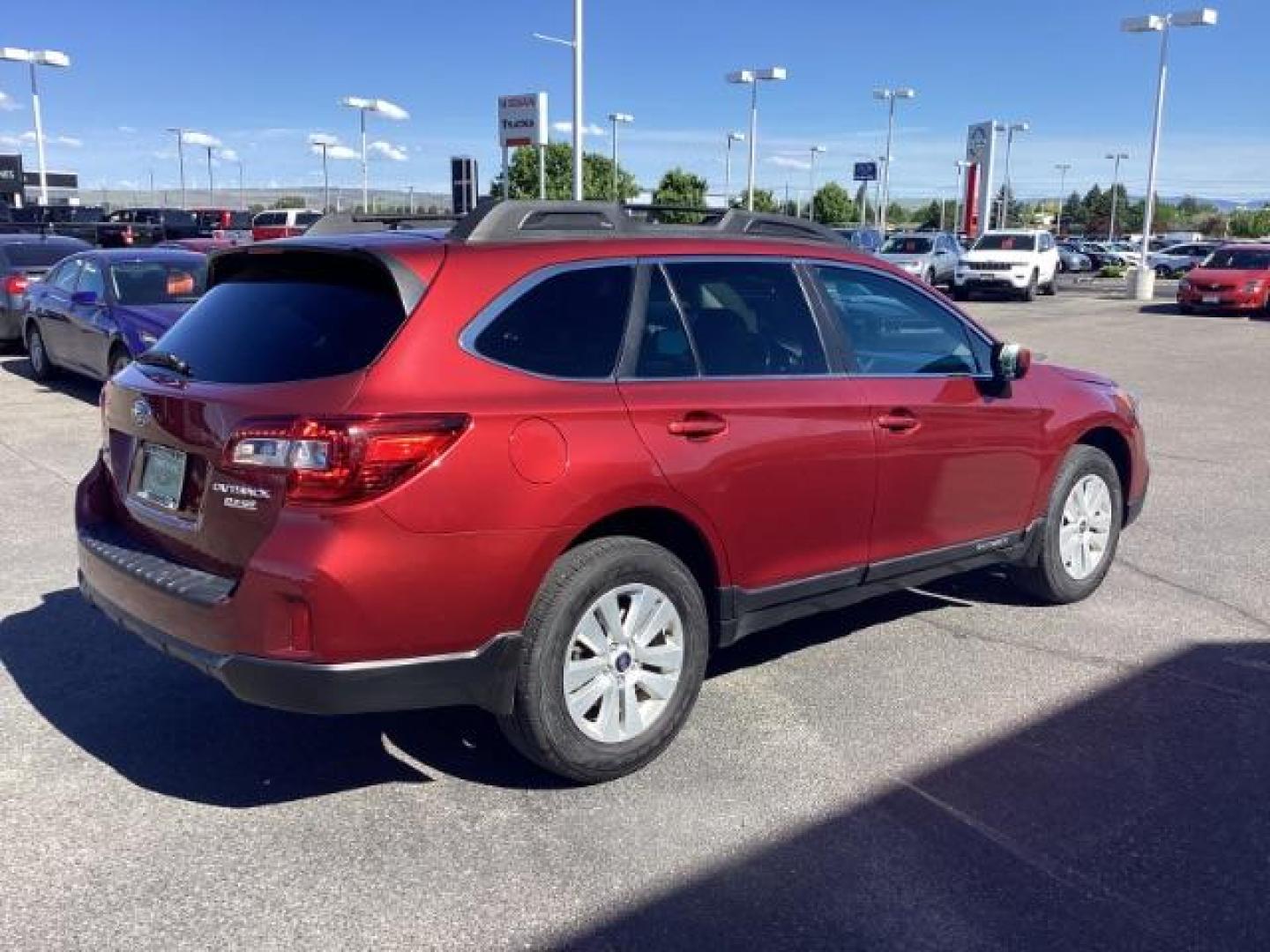 2015 Venetian Red Pearl /Slate Black Subaru Outback 2.5i Premium (4S4BSADC8F3) with an 2.5L H4 DOHC 16V engine, 6-Speed Automatic transmission, located at 1235 N Woodruff Ave., Idaho Falls, 83401, (208) 523-1053, 43.507172, -112.000488 - Photo#4