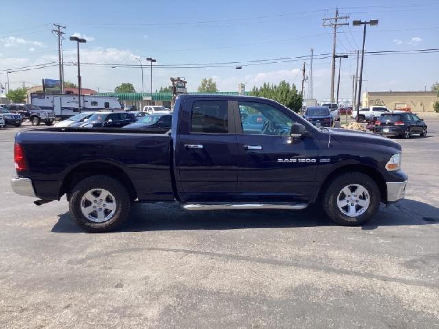 2012 BLUE /Dark Slate/Medium Graystone Cloth Interior RAM 1500 SLT Quad Cab 4WD (1C6RD7GT3CS) with an 5.7L V8 OHV 16V engine, 5-Speed Automatic transmission, located at 1235 N Woodruff Ave., Idaho Falls, 83401, (208) 523-1053, 43.507172, -112.000488 - Photo#6