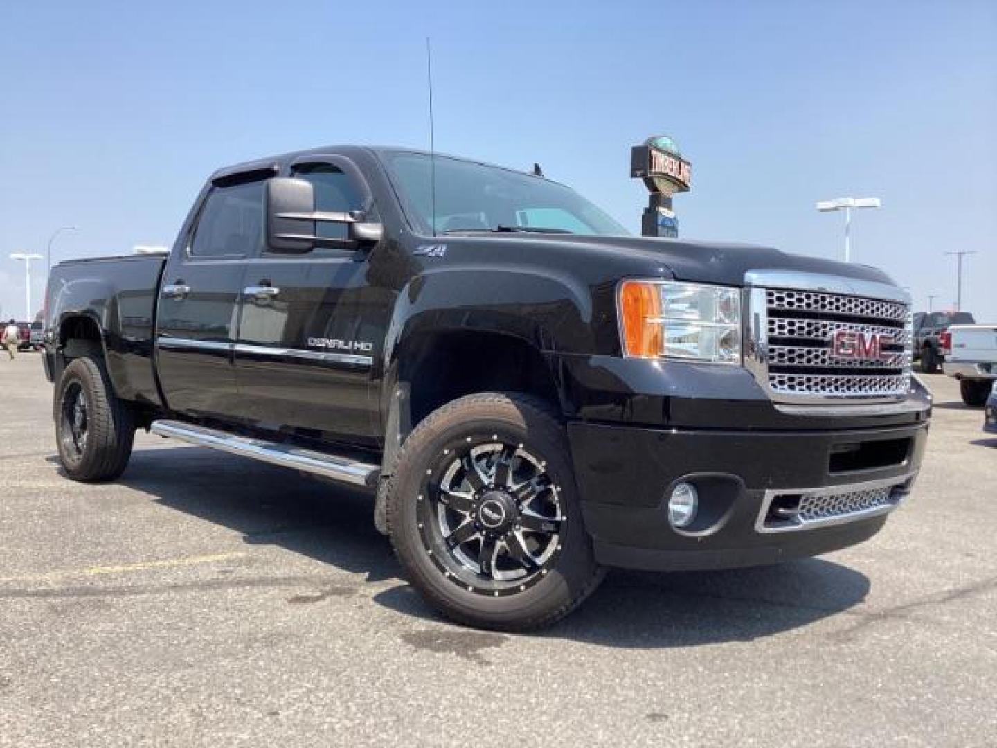 2012 Onyx Black GMC Sierra 2500HD Denali Crew Cab 4WD (1GT125E80CF) with an 6.6L V8 OHV 32V TURBO DIESEL engine, 6-Speed Automatic transmission, located at 1235 N Woodruff Ave., Idaho Falls, 83401, (208) 523-1053, 43.507172, -112.000488 - Photo#9