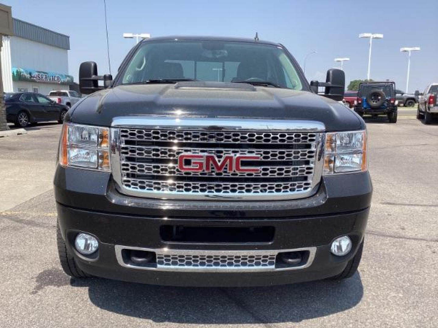 2012 Onyx Black GMC Sierra 2500HD Denali Crew Cab 4WD (1GT125E80CF) with an 6.6L V8 OHV 32V TURBO DIESEL engine, 6-Speed Automatic transmission, located at 1235 N Woodruff Ave., Idaho Falls, 83401, (208) 523-1053, 43.507172, -112.000488 - Photo#10