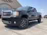 2012 Onyx Black GMC Sierra 2500HD Denali Crew Cab 4WD (1GT125E80CF) with an 6.6L V8 OHV 32V TURBO DIESEL engine, 6-Speed Automatic transmission, located at 1235 N Woodruff Ave., Idaho Falls, 83401, (208) 523-1053, 43.507172, -112.000488 - Photo#1