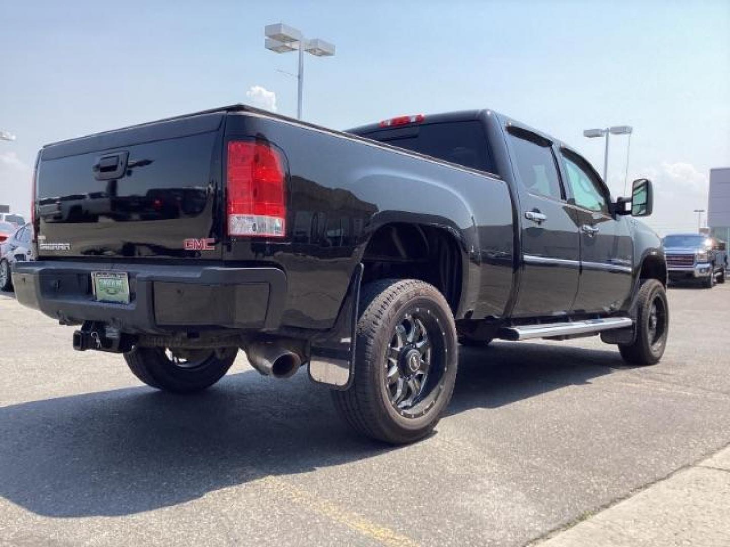 2012 Onyx Black GMC Sierra 2500HD Denali Crew Cab 4WD (1GT125E80CF) with an 6.6L V8 OHV 32V TURBO DIESEL engine, 6-Speed Automatic transmission, located at 1235 N Woodruff Ave., Idaho Falls, 83401, (208) 523-1053, 43.507172, -112.000488 - Photo#6