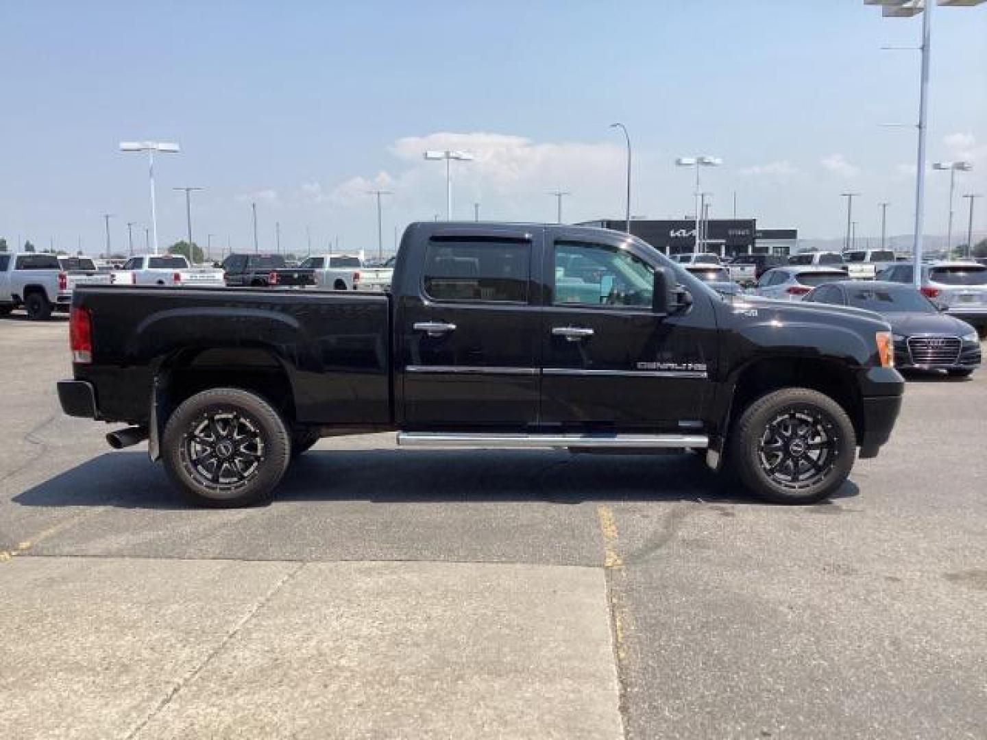 2012 Onyx Black GMC Sierra 2500HD Denali Crew Cab 4WD (1GT125E80CF) with an 6.6L V8 OHV 32V TURBO DIESEL engine, 6-Speed Automatic transmission, located at 1235 N Woodruff Ave., Idaho Falls, 83401, (208) 523-1053, 43.507172, -112.000488 - Photo#8