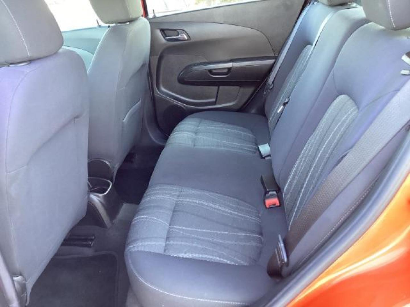 2012 Inferno Orange Metallic /Jet Blk/ Dark Titanium Cloth Interior Chevrolet Sonic 1LT 5-Door (1G1JD6SB5C4) with an 1.4L L4 DOHC 24V TURBO engine, 5-Speed Manual transmission, located at 1235 N Woodruff Ave., Idaho Falls, 83401, (208) 523-1053, 43.507172, -112.000488 - Photo#18