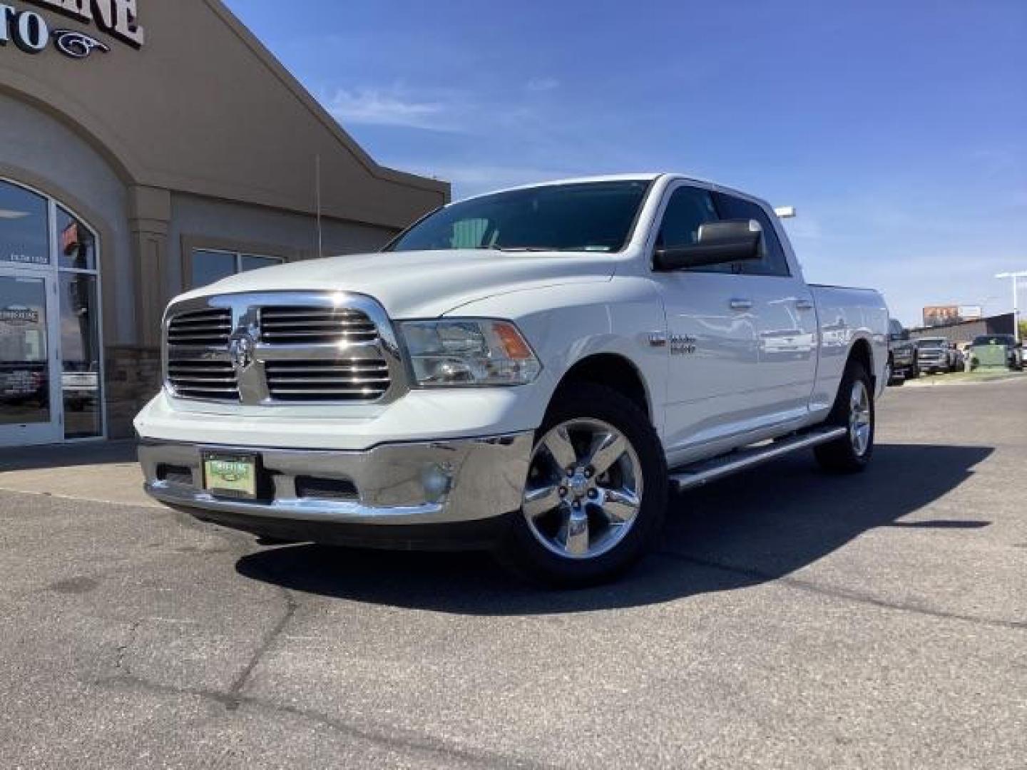 2016 WHITE /Black/Diesel Gray, cloth RAM 1500 SLT Crew Cab LWB 4WD (1C6RR7TT6GS) with an 5.7L V8 OHV 16V engine, 8-Speed Automatic transmission, located at 1235 N Woodruff Ave., Idaho Falls, 83401, (208) 523-1053, 43.507172, -112.000488 - Photo#1