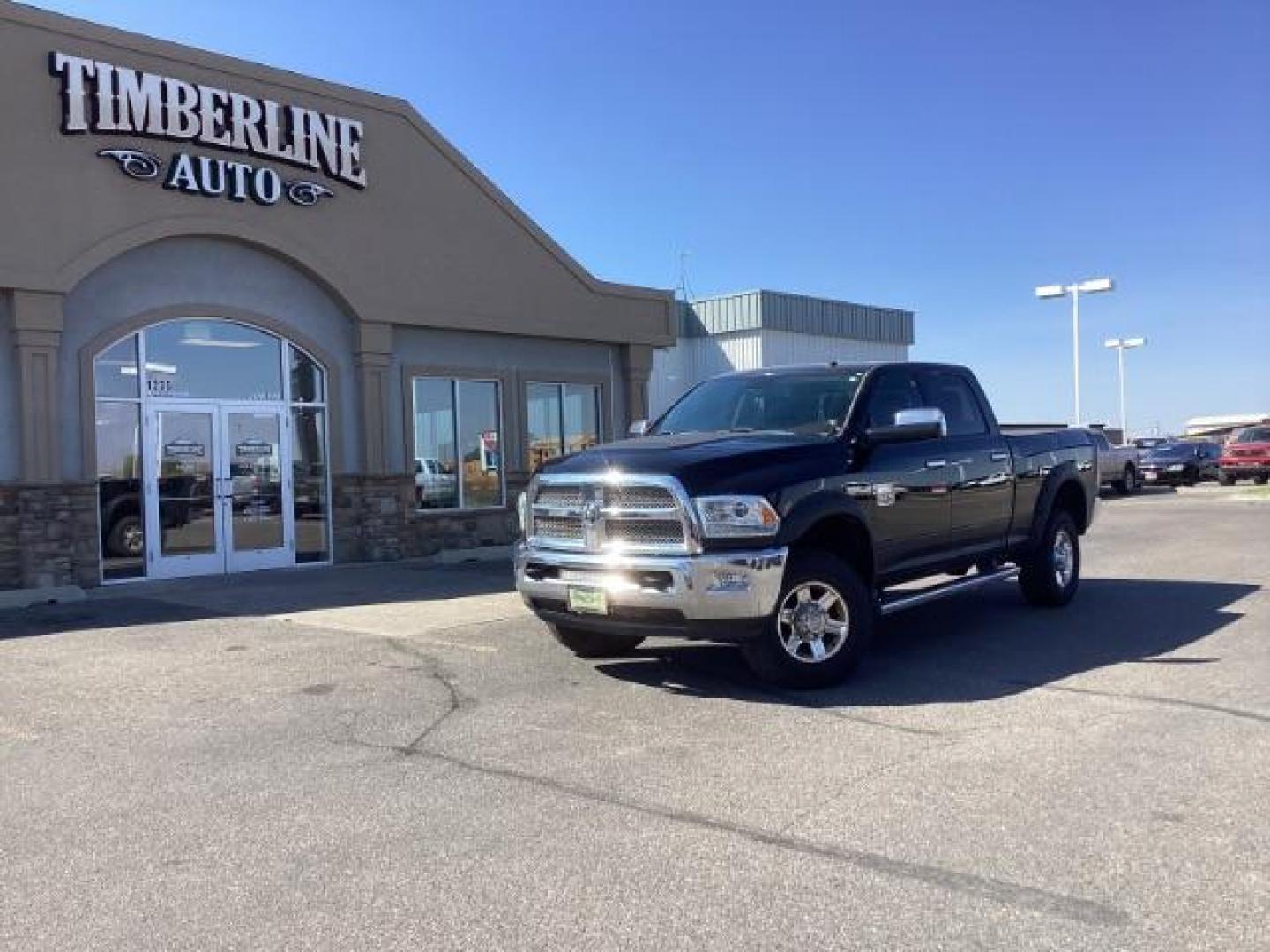 2013 Black Clearcoat /Cattle Tan/Black RAM 2500 Laramie Longhorn Edition Crew Cab SWB 4WD (3C6TR5GT5DG) with an 5.7L V8 OHV 16V engine, 6-Speed Automatic transmission, located at 1235 N Woodruff Ave., Idaho Falls, 83401, (208) 523-1053, 43.507172, -112.000488 - Photo#0