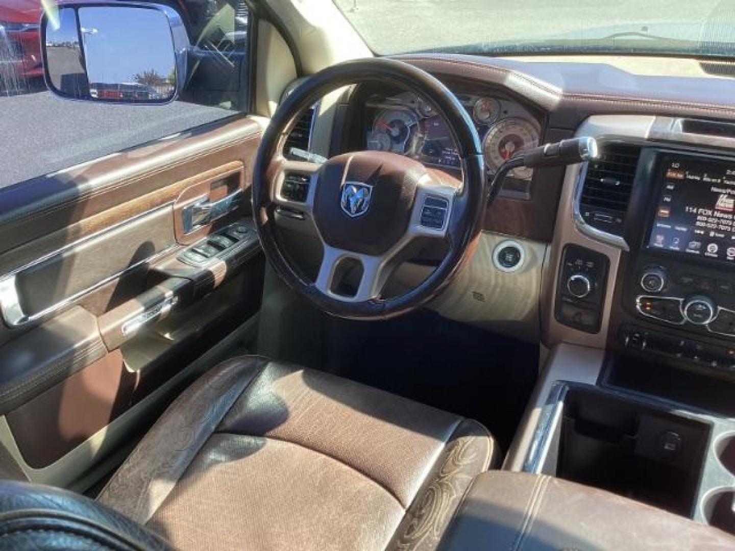 2013 Black Clearcoat /Cattle Tan/Black RAM 2500 Laramie Longhorn Edition Crew Cab SWB 4WD (3C6TR5GT5DG) with an 5.7L V8 OHV 16V engine, 6-Speed Automatic transmission, located at 1235 N Woodruff Ave., Idaho Falls, 83401, (208) 523-1053, 43.507172, -112.000488 - Photo#14