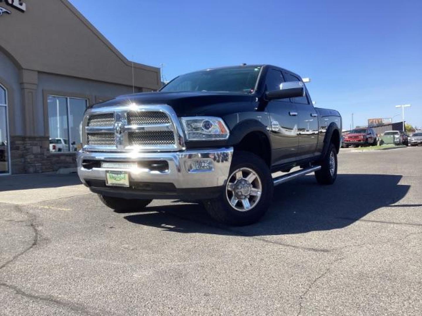 2013 Black Clearcoat /Cattle Tan/Black RAM 2500 Laramie Longhorn Edition Crew Cab SWB 4WD (3C6TR5GT5DG) with an 5.7L V8 OHV 16V engine, 6-Speed Automatic transmission, located at 1235 N Woodruff Ave., Idaho Falls, 83401, (208) 523-1053, 43.507172, -112.000488 - Photo#1