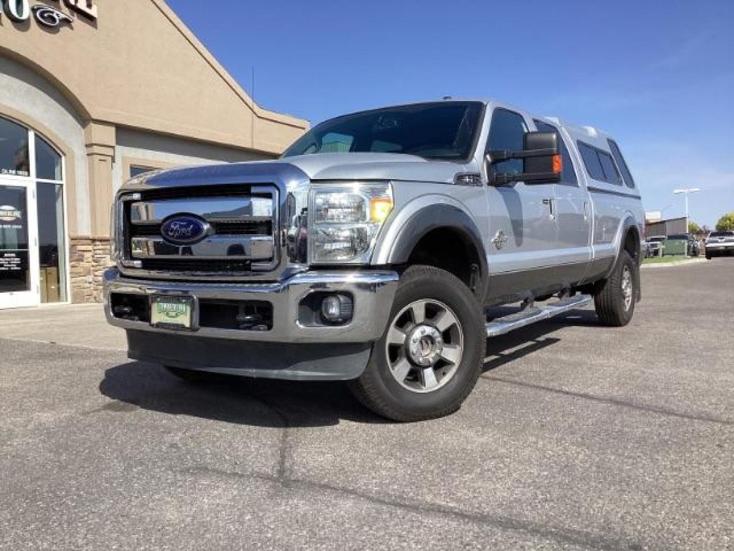 2012 Ingot Silver Metallic /Black Leather Interior Ford F-350 SD Lariat Crew Cab Long Bed 4WD (1FT8W3BT4CE) with an 6.7L V8 OHV 16V DIESEL engine, 6-Speed Automatic transmission, located at 1235 N Woodruff Ave., Idaho Falls, 83401, (208) 523-1053, 43.507172, -112.000488 - Photo#1