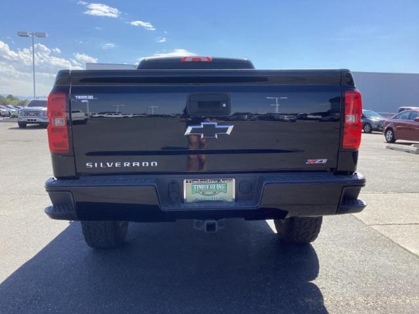 2018 Black /Jet Black, cloth Chevrolet Silverado 1500 LT Long Box 4WD (1GCNKREC1JZ) with an 5.3L V8 engine, 6-Speed Automatic transmission, located at 1235 N Woodruff Ave., Idaho Falls, 83401, (208) 523-1053, 43.507172, -112.000488 - Photo#4